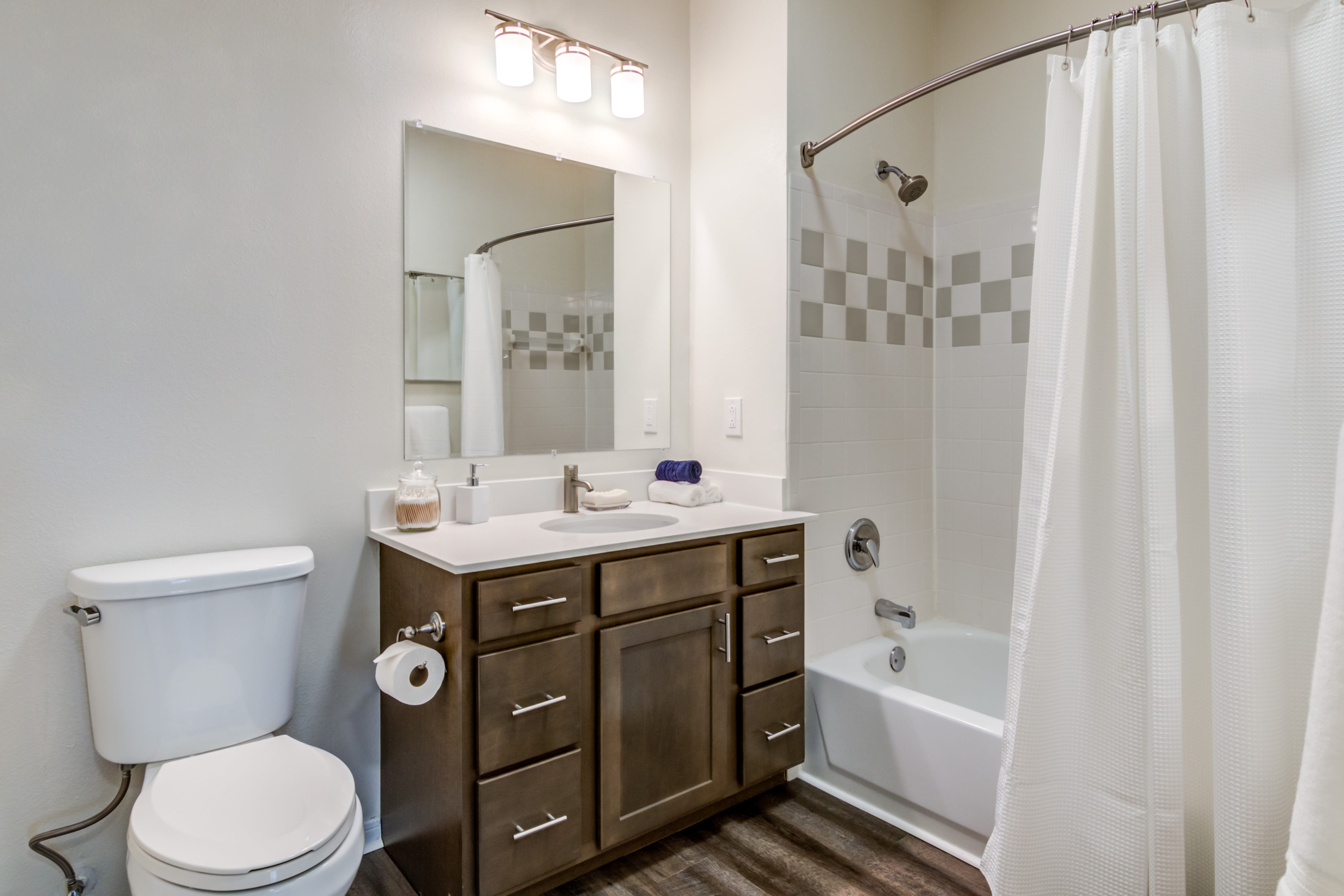 Clean bathroom with a shower tub at Sofi Parc Grove in Stamford, Connecticut