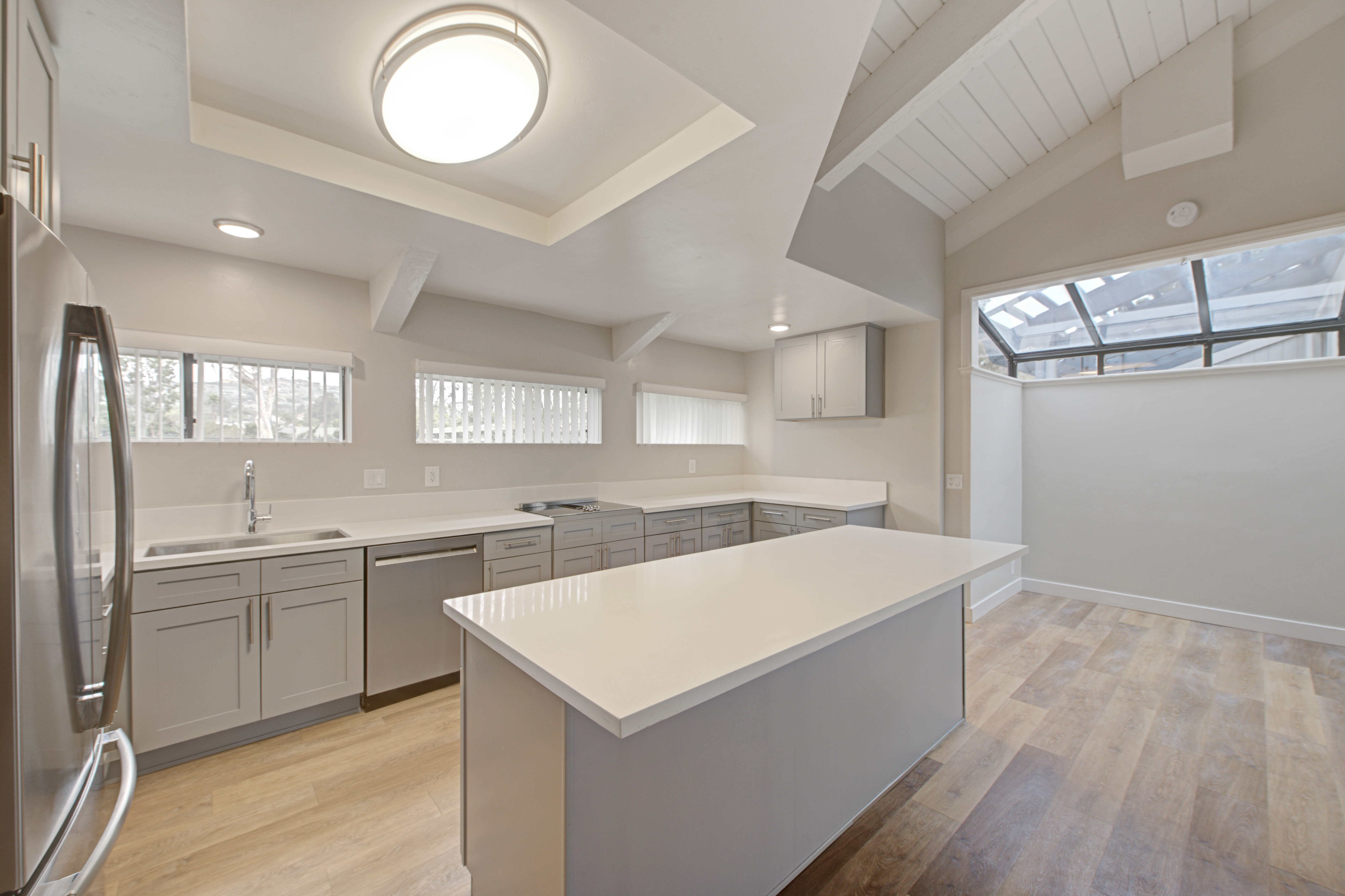 Luxury kitchens with hardwood floors at Sofi Ventura in Ventura, California
