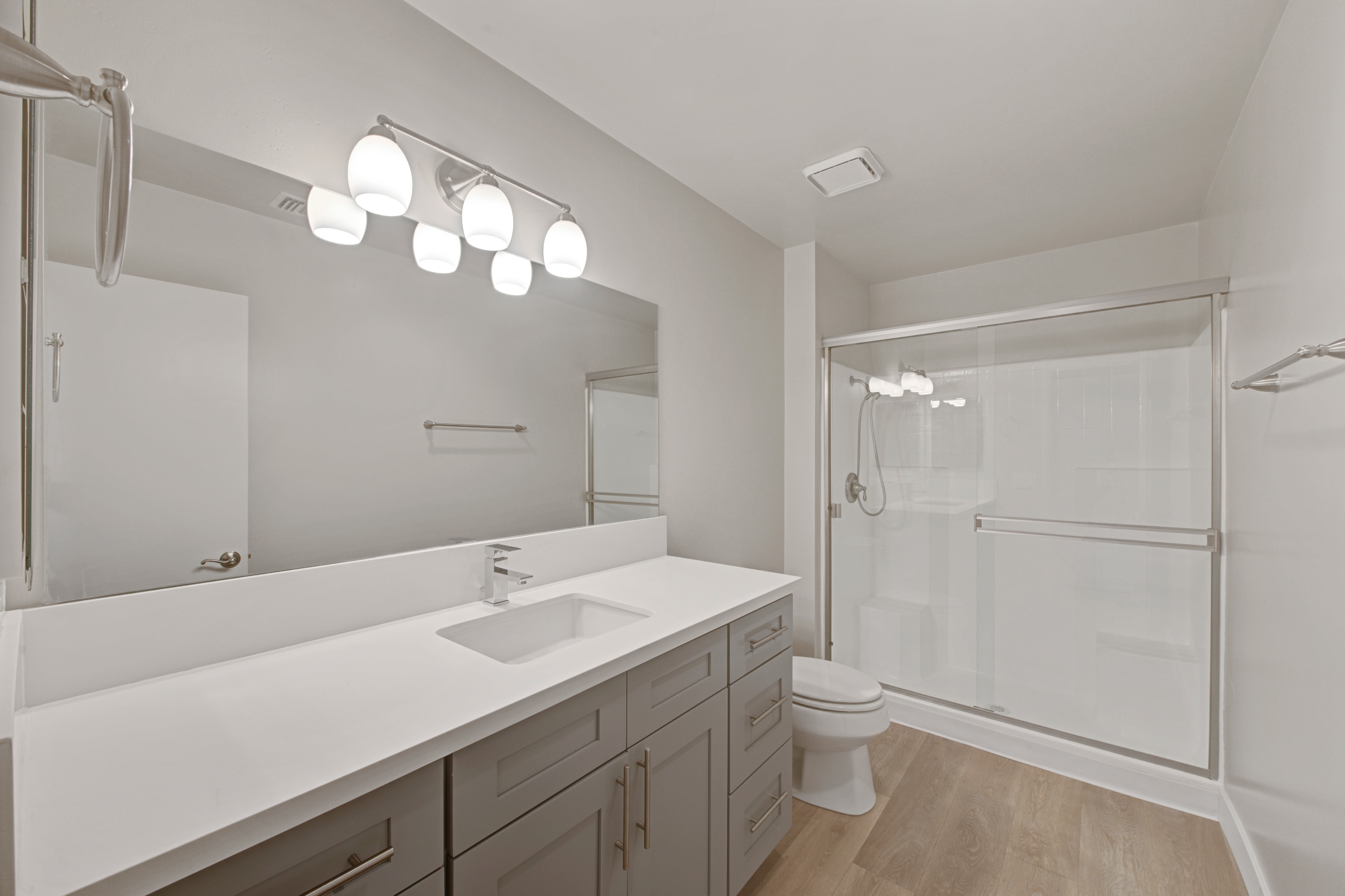 Luxury bathrooms with shower and bathtub at Sofi Ventura in Ventura, California