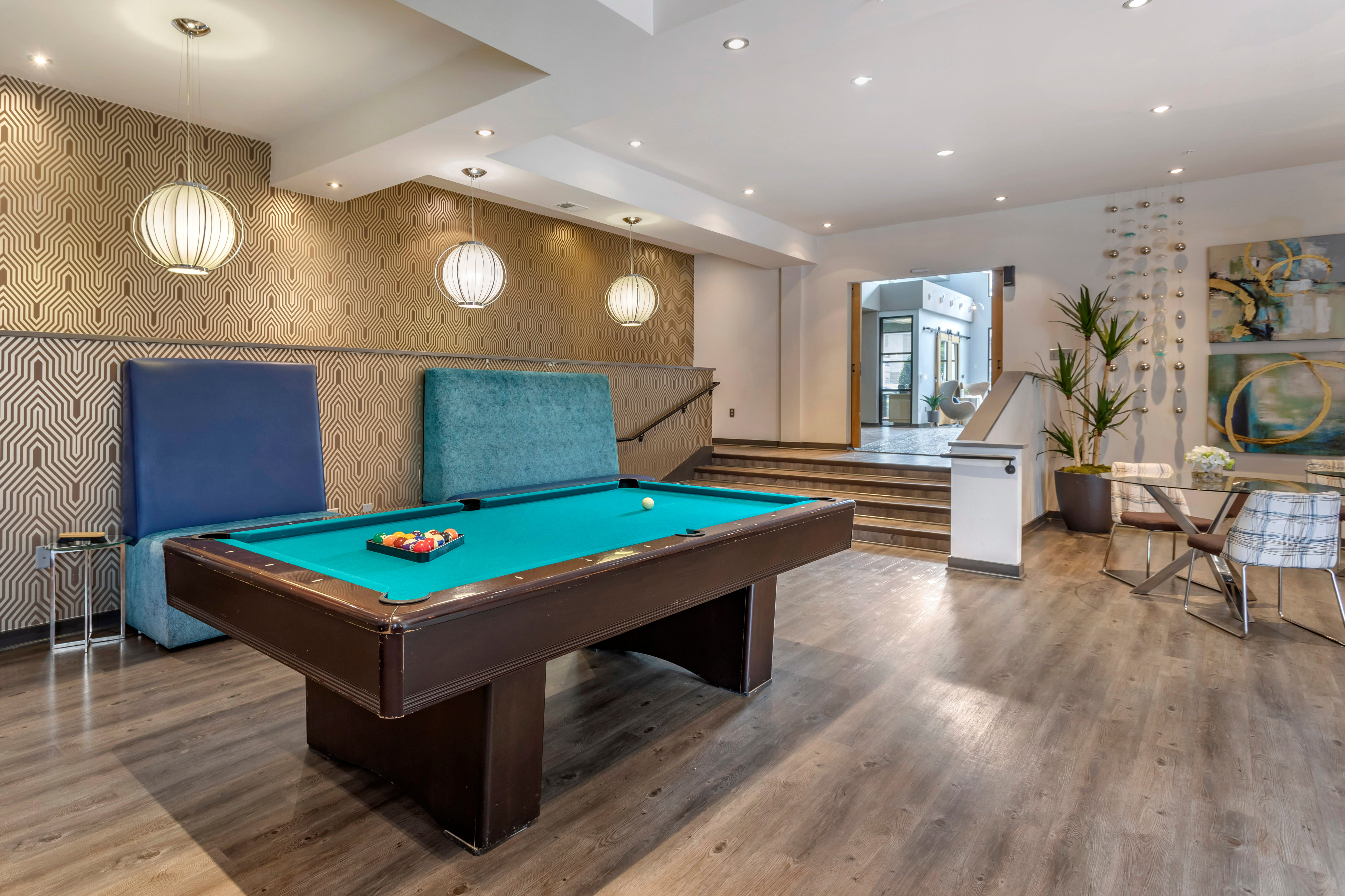 Billiards table and more in the resident clubhouse at Olympus Midtown in Nashville, Tennessee