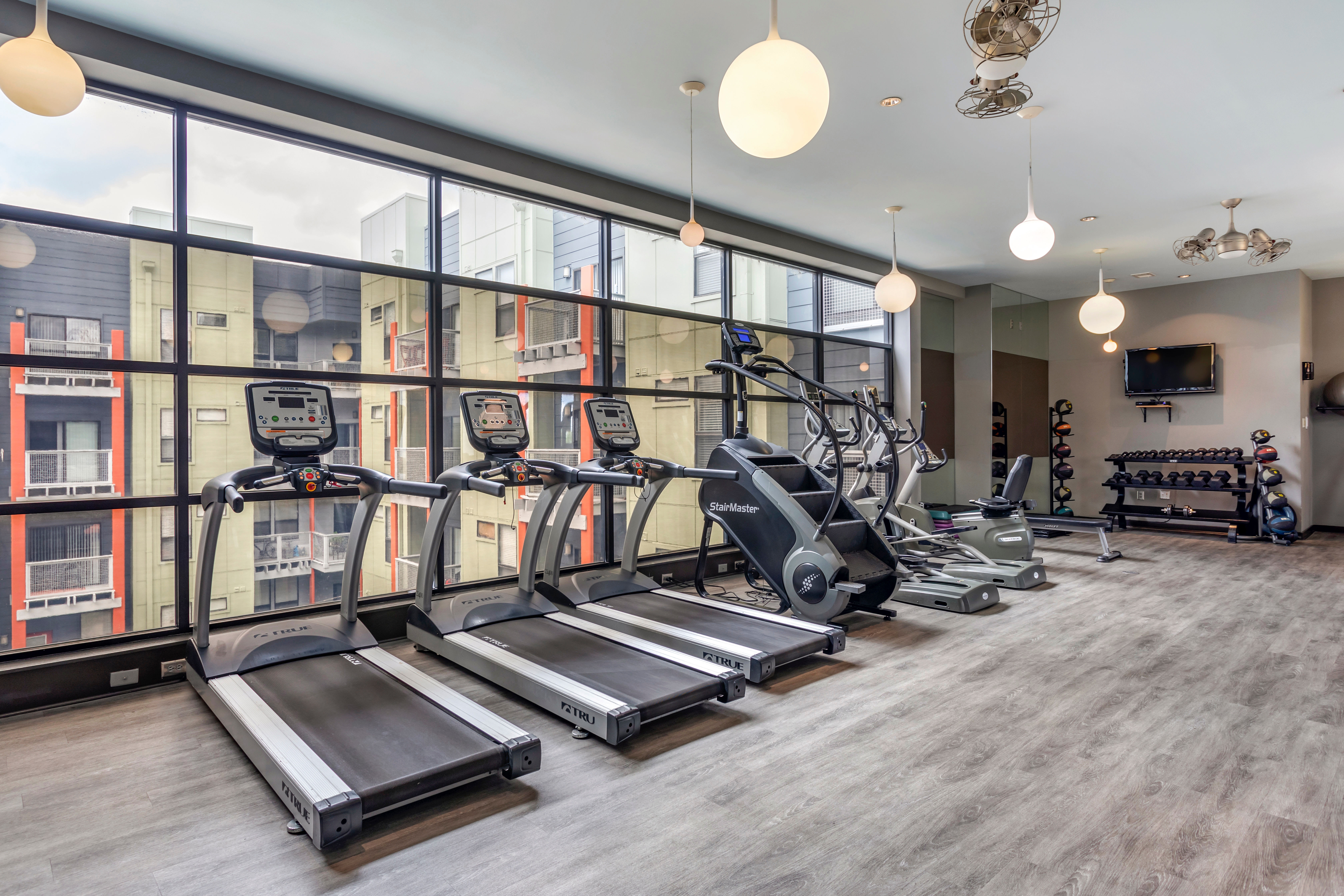 Plenty of cardio equipment in the fitness center at Olympus Midtown in Nashville, Tennessee
