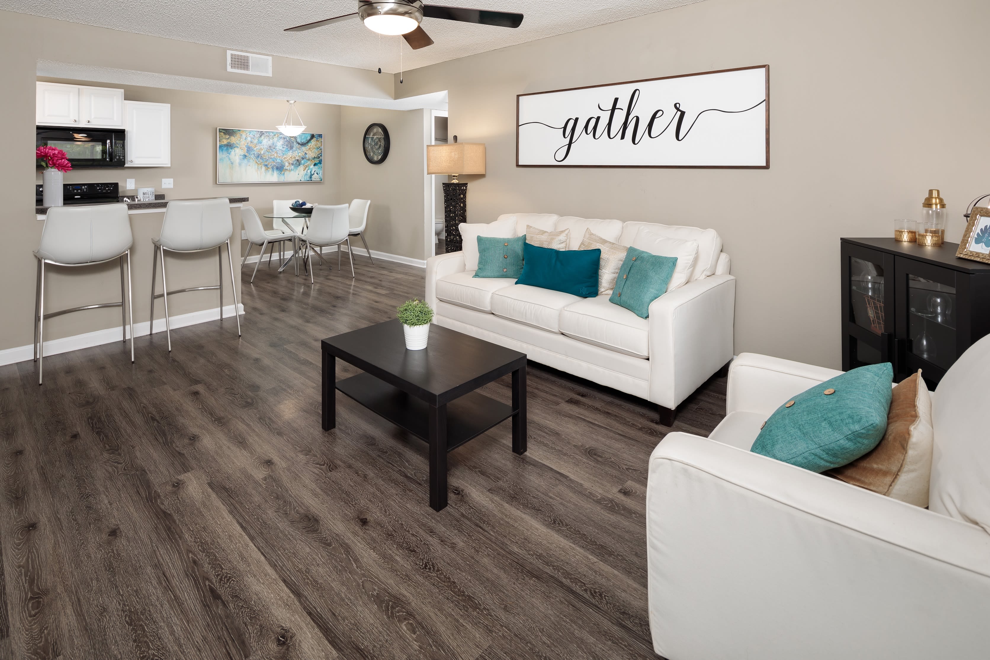 A living room in an apartment at 1801 MetroWest in Orlando, Florida
