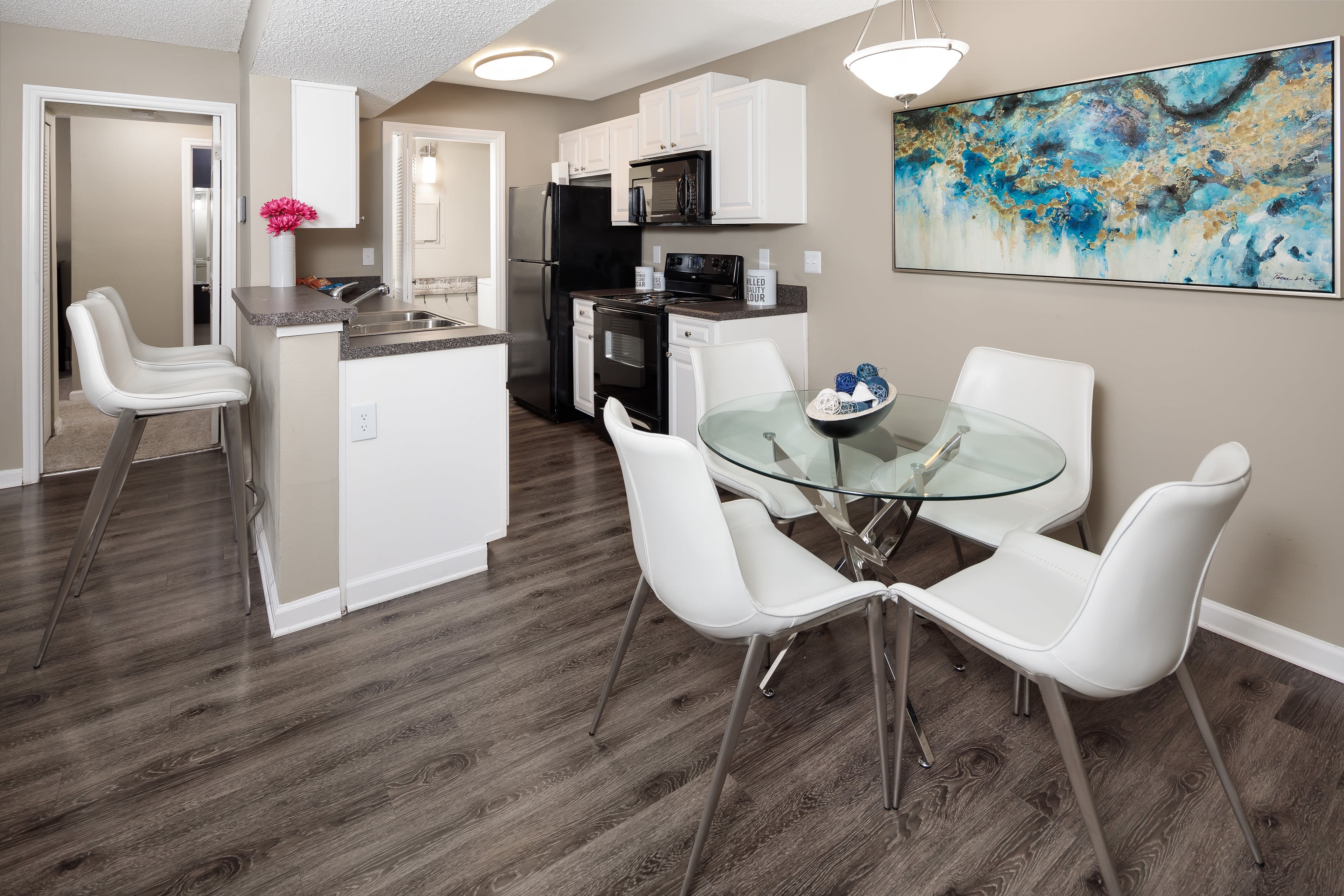 A dining area in an apartment at 1801 MetroWest in Orlando, Florida