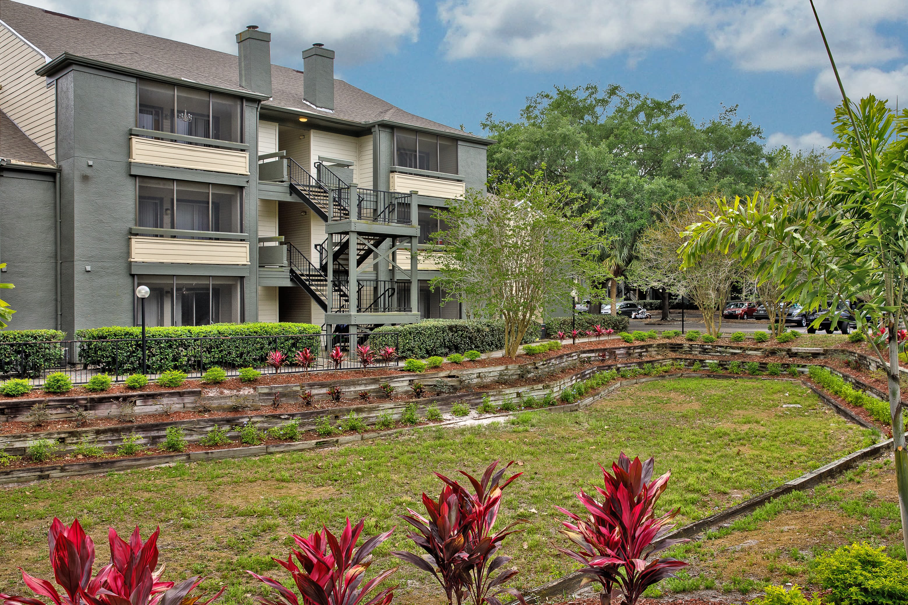 A lush landscape outside at 1801 MetroWest in Orlando, Florida