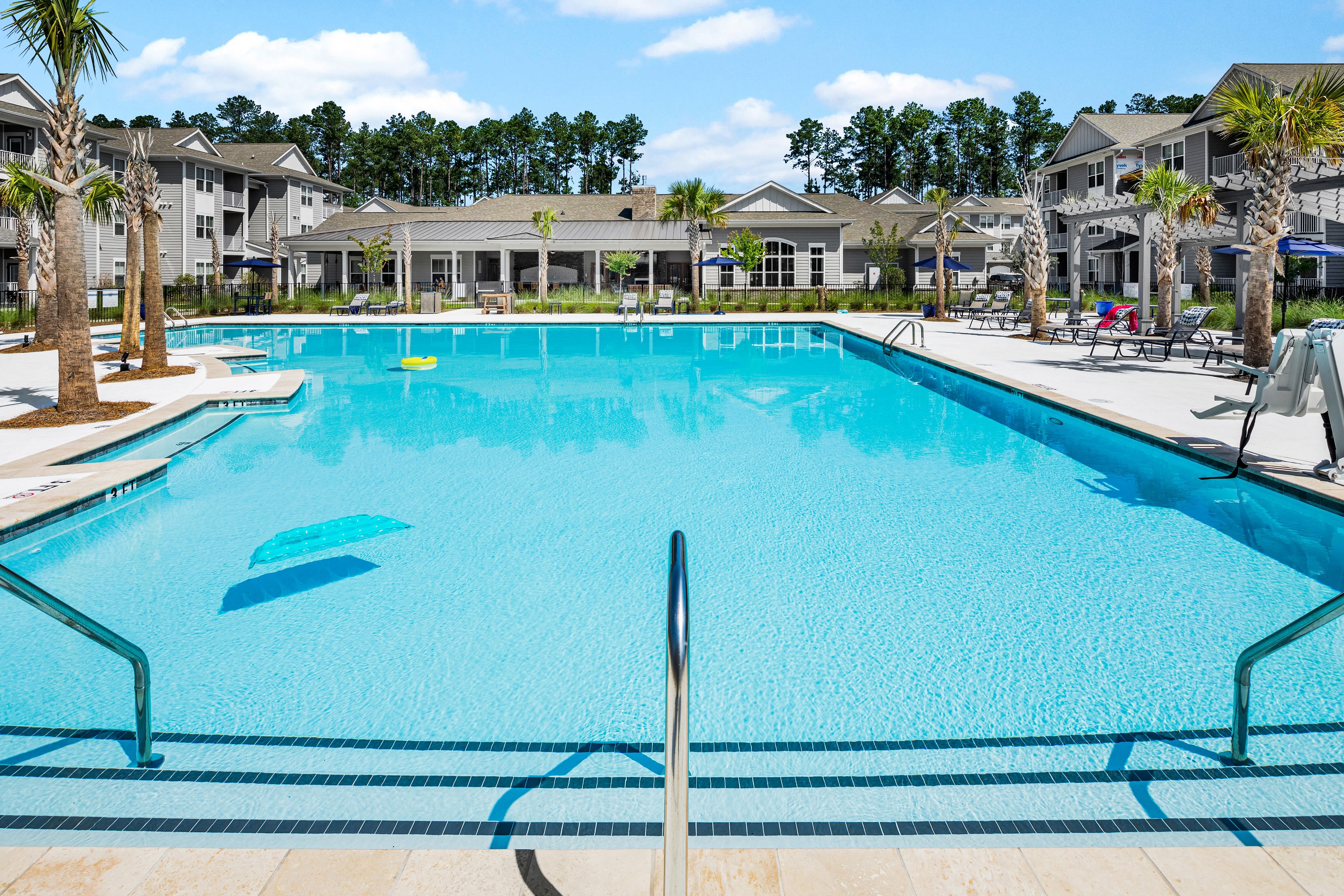 Incredible resort style swimming pool on a gorgeous day at The Isaac in Summerville, South Carolina