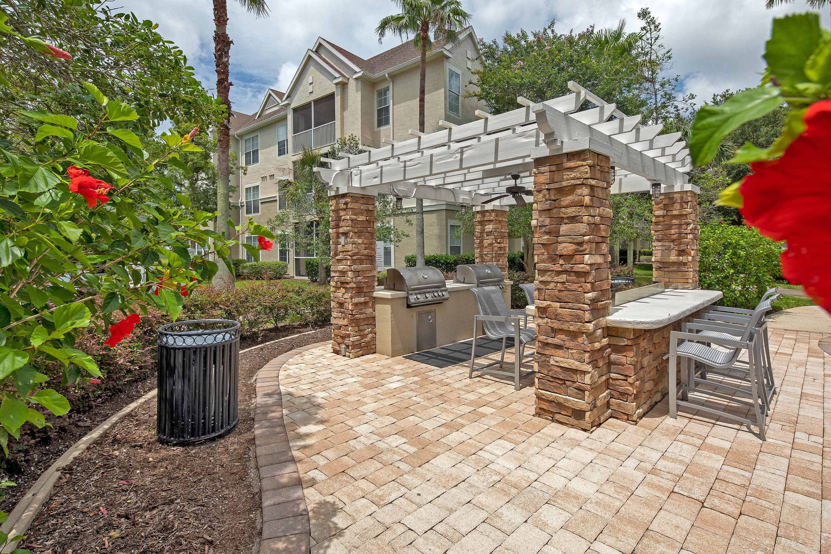 Amazing outdoor grilling area near the pool in Jacksonville, Florida near Eddison at Deerwood Park