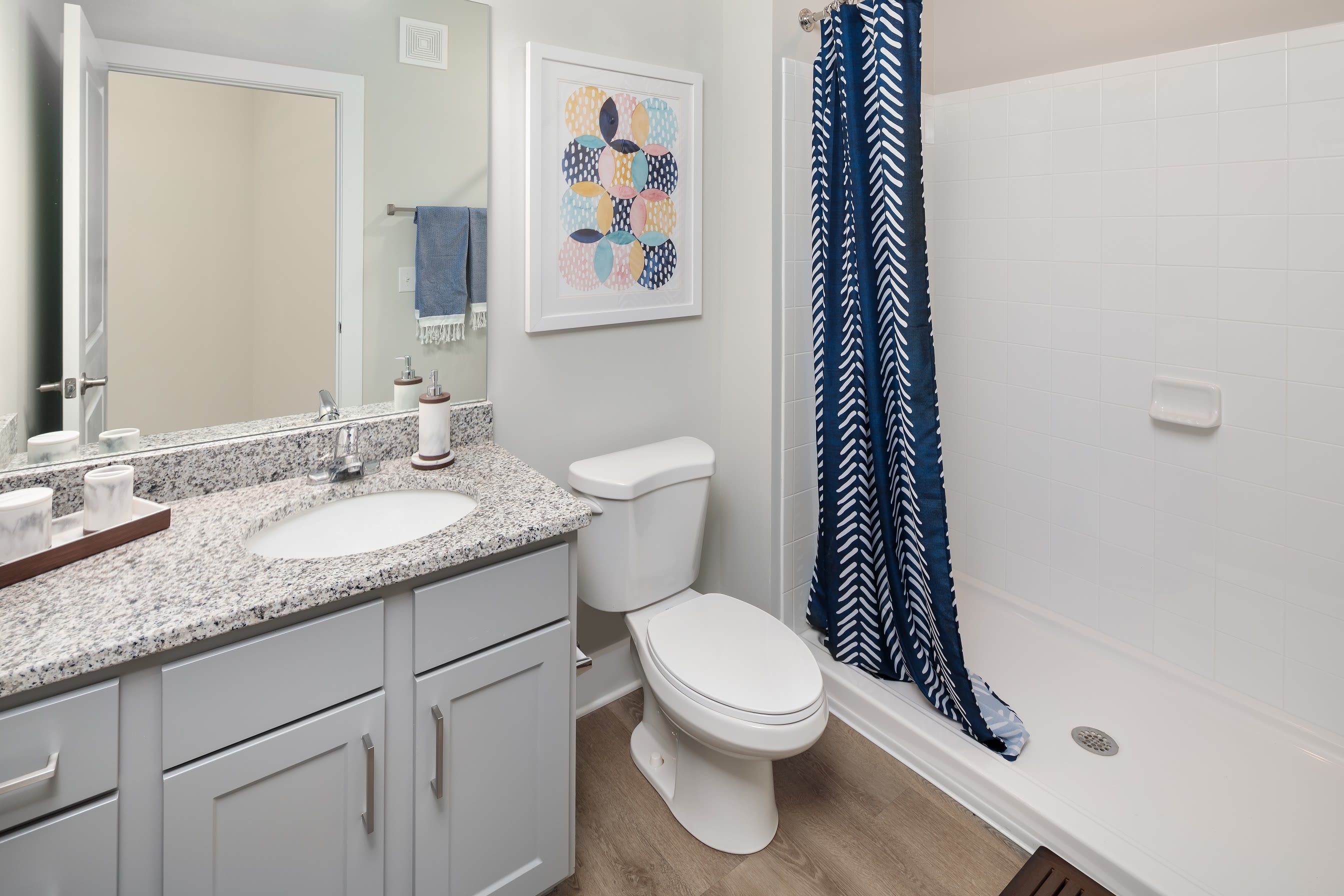 Roomy bathroom with lots of storage space under the large vanity at The Mason in Ladson, South Carolina