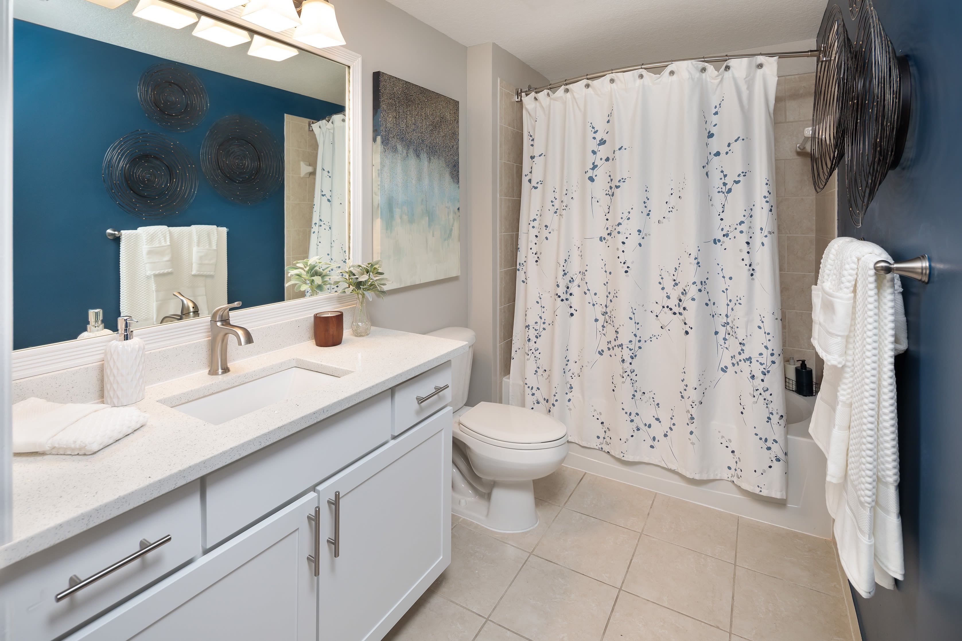 Nice bathroom with shower and large vanity mirror at The Pearl in Ft Lauderdale, Florida
