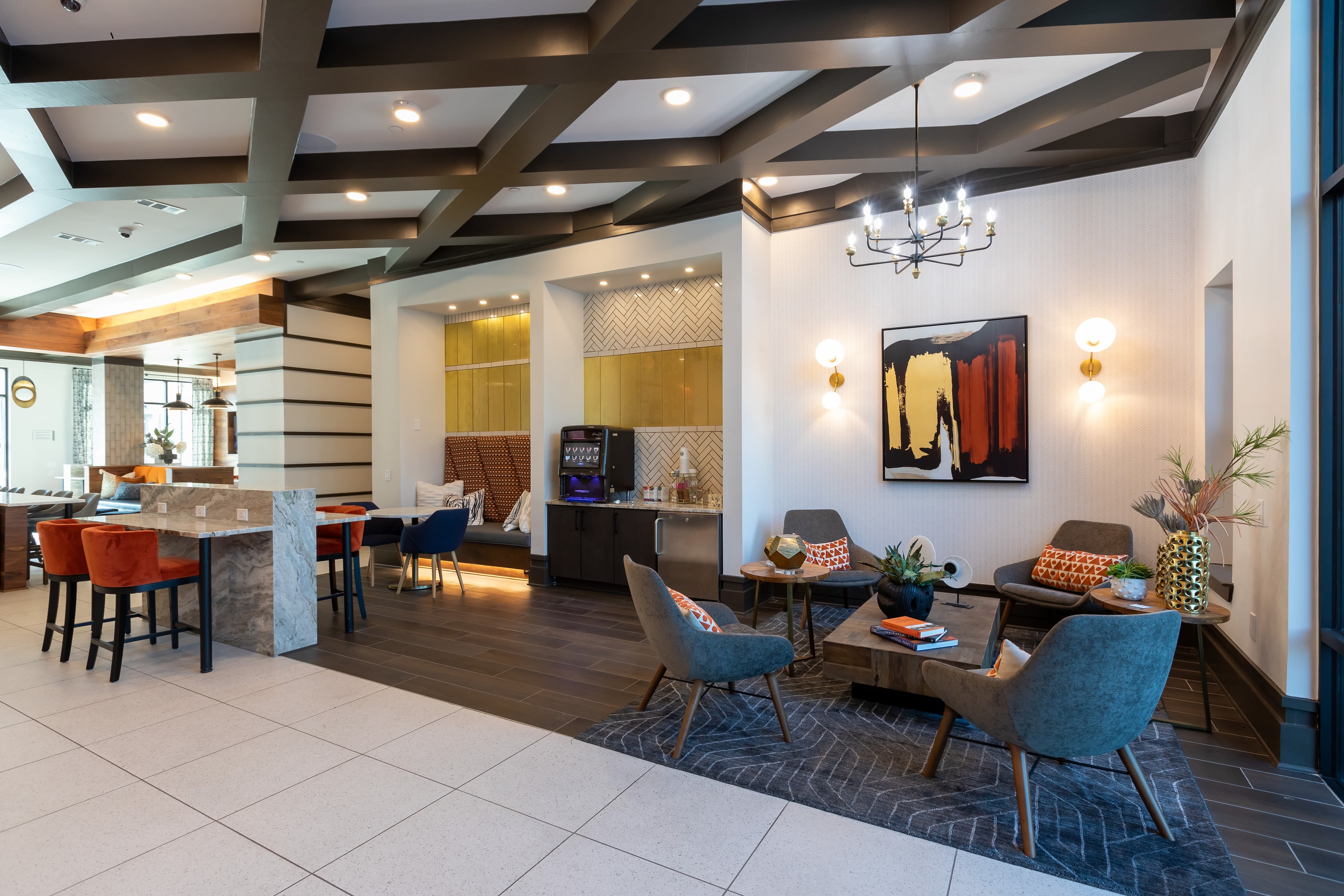 Spend time with friends and family in the common area at The ReVe in Garland, Texas