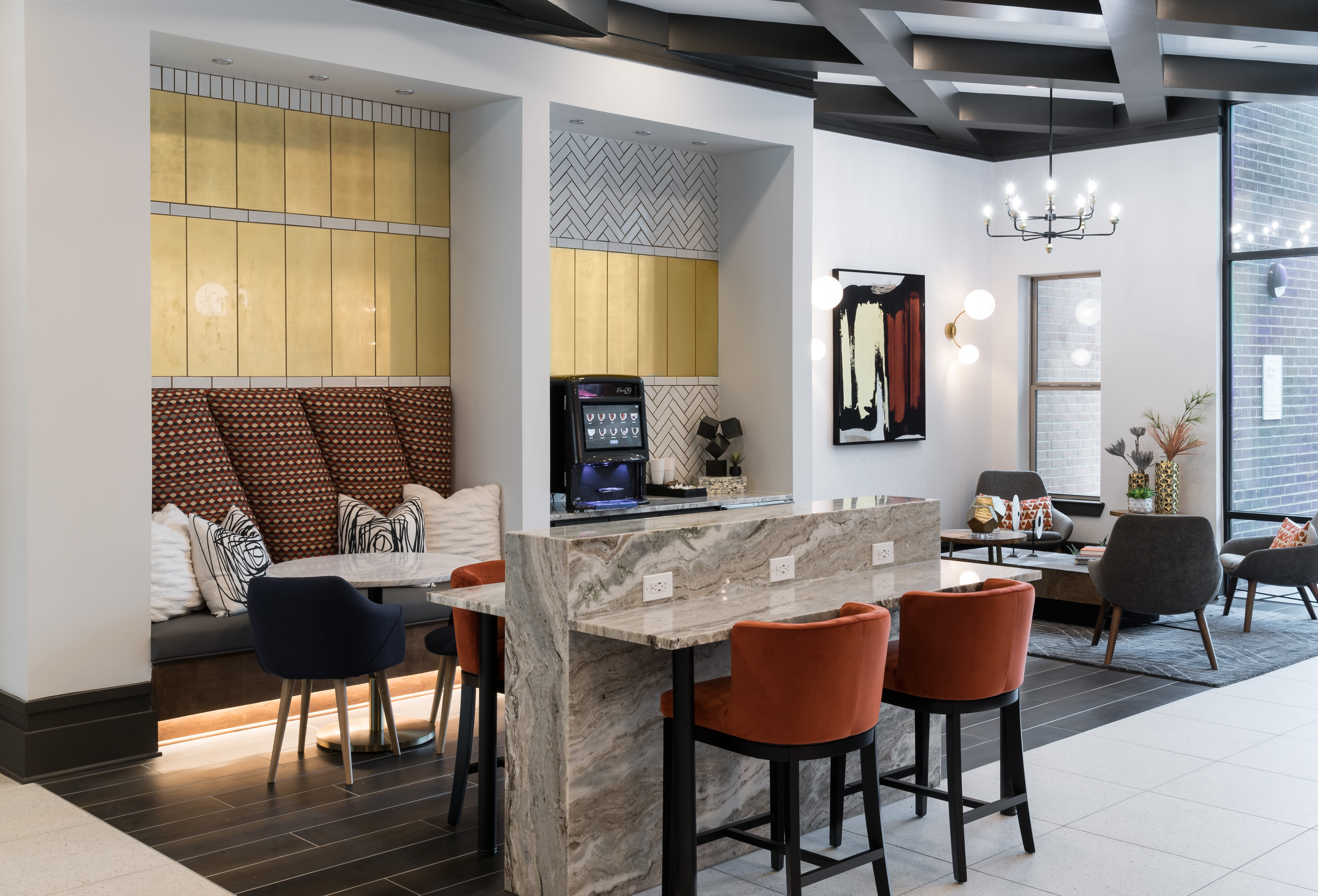 Resident lounge area with bar at The ReVe in Garland, Texas