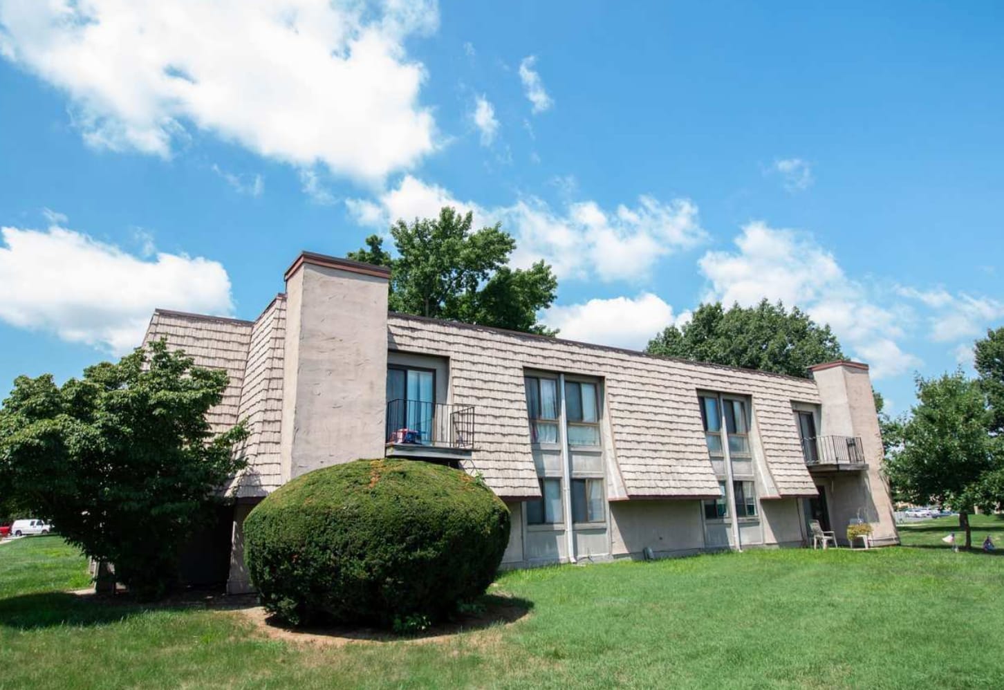Exterior with large lawn at Forest Creek in West Deptford, New Jersey