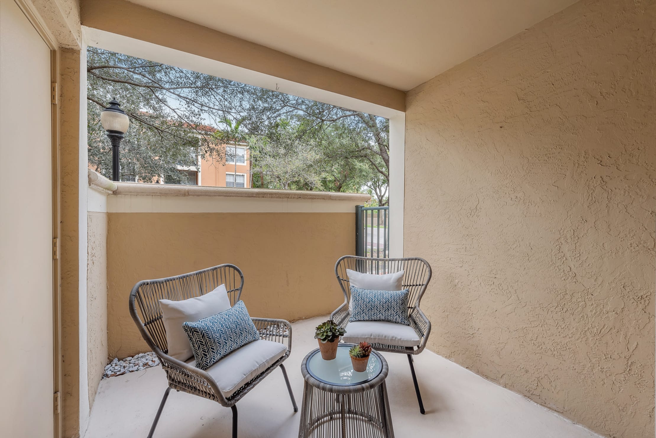 Private patio space at Crescent House Apartments in Miami Lakes, Florida
