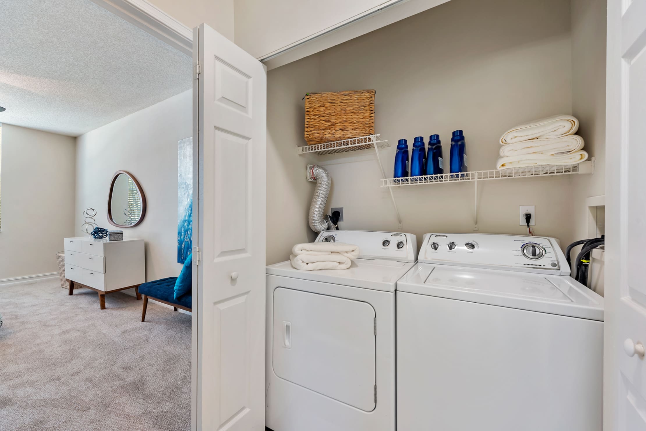 Laundry room in model home at Fountain House Apartments in Miami Lakes, Florida
