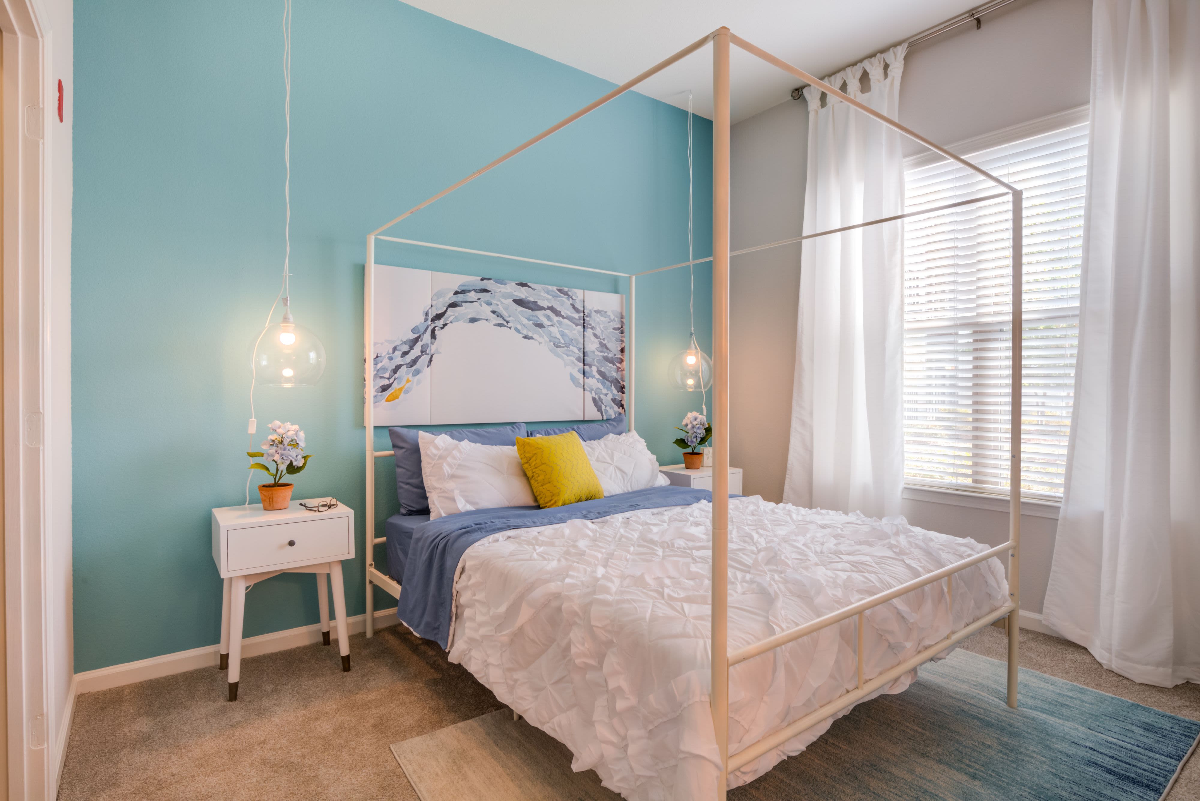 Model bedroom at Celsius Apartment Homes in Charlotte, North Carolina