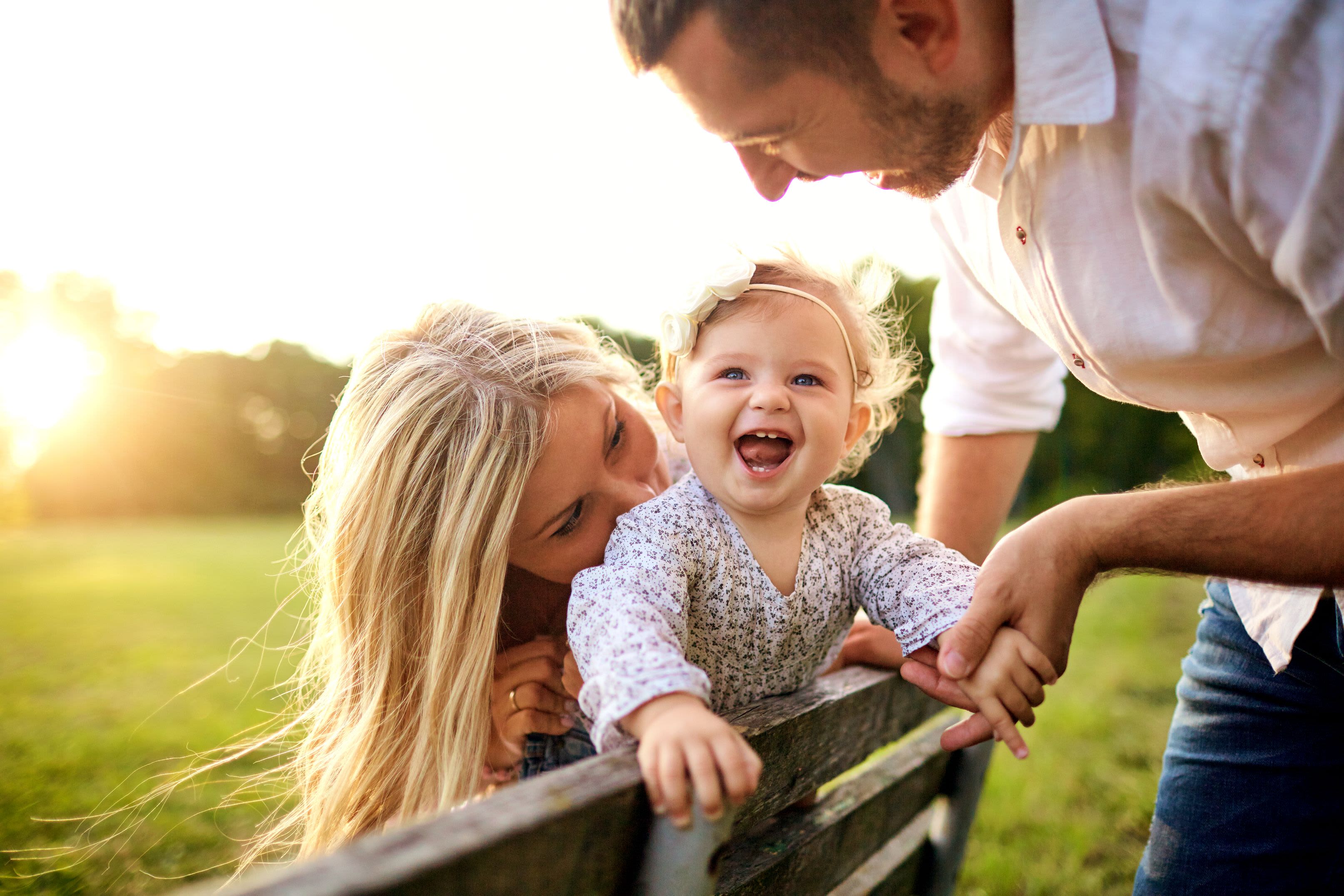 Residents smiling at laughing babyWadsworth Shores in Virginia Beach, Virginia