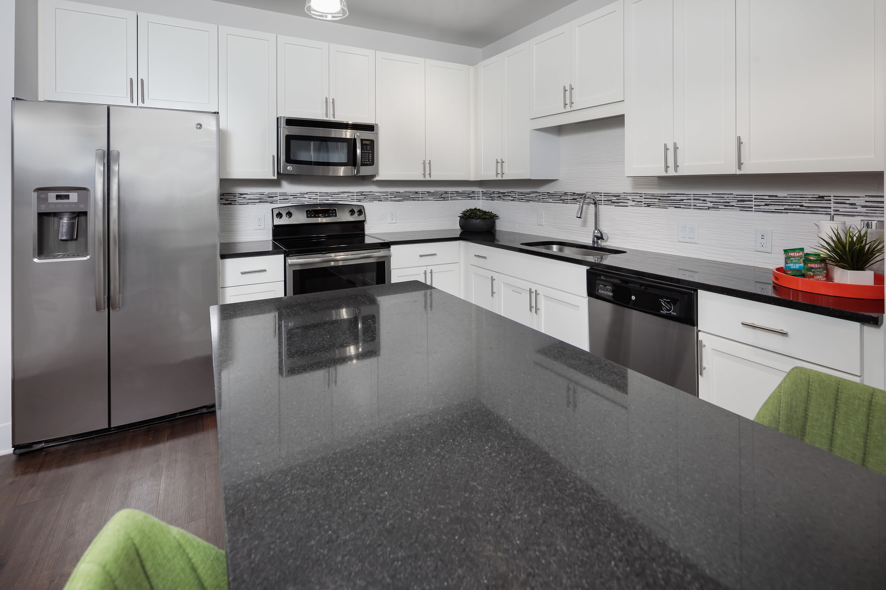 Large kitchen island that goes into the dining area at Central Station on Orange in Orlando, Florida