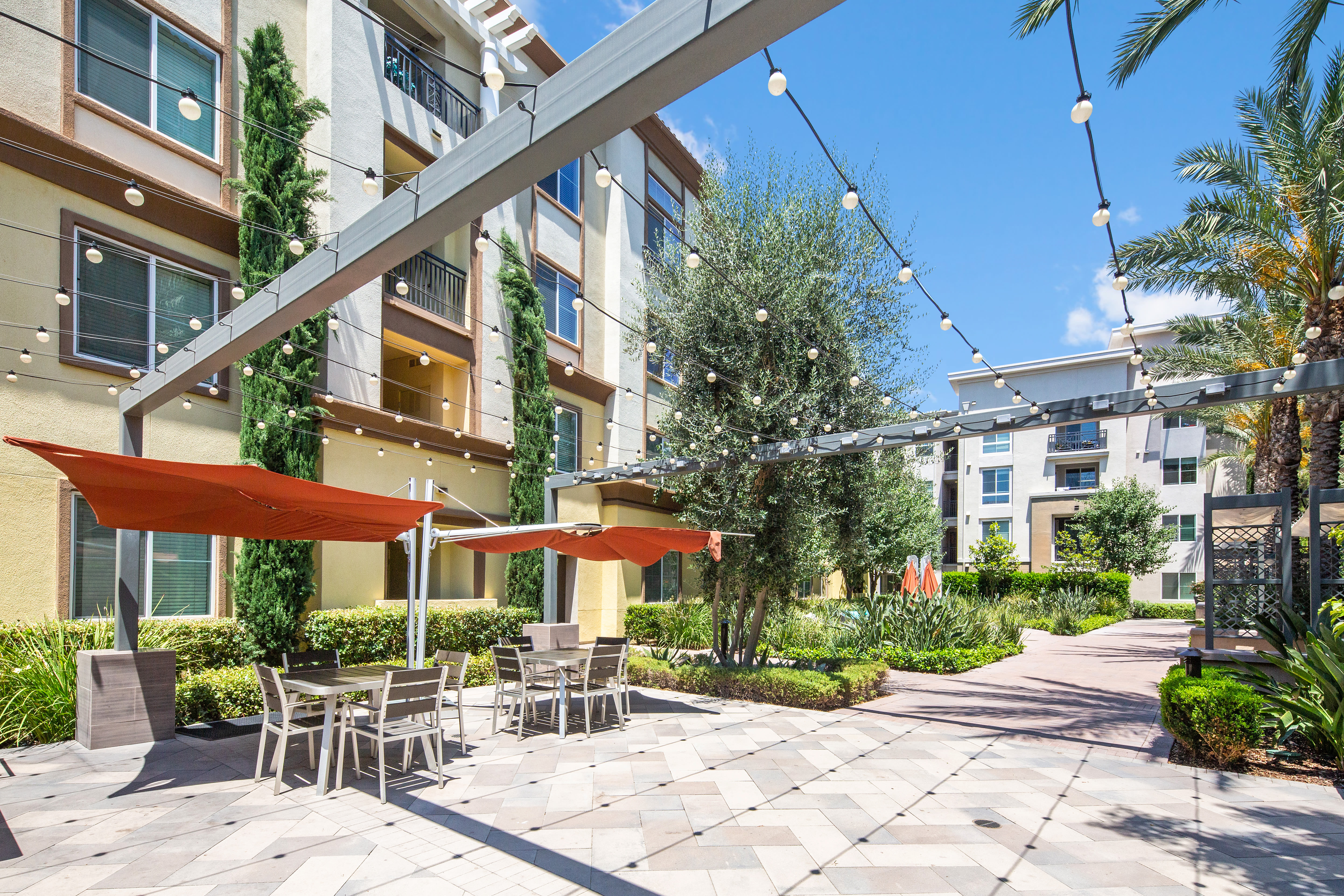 Shaded courtyard seating at The Boulevard Apartment Homes in Woodland Hills, California