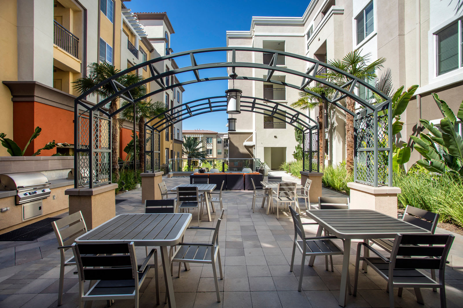 Courtyard with seating at The Boulevard Apartment Homes in Woodland Hills, California