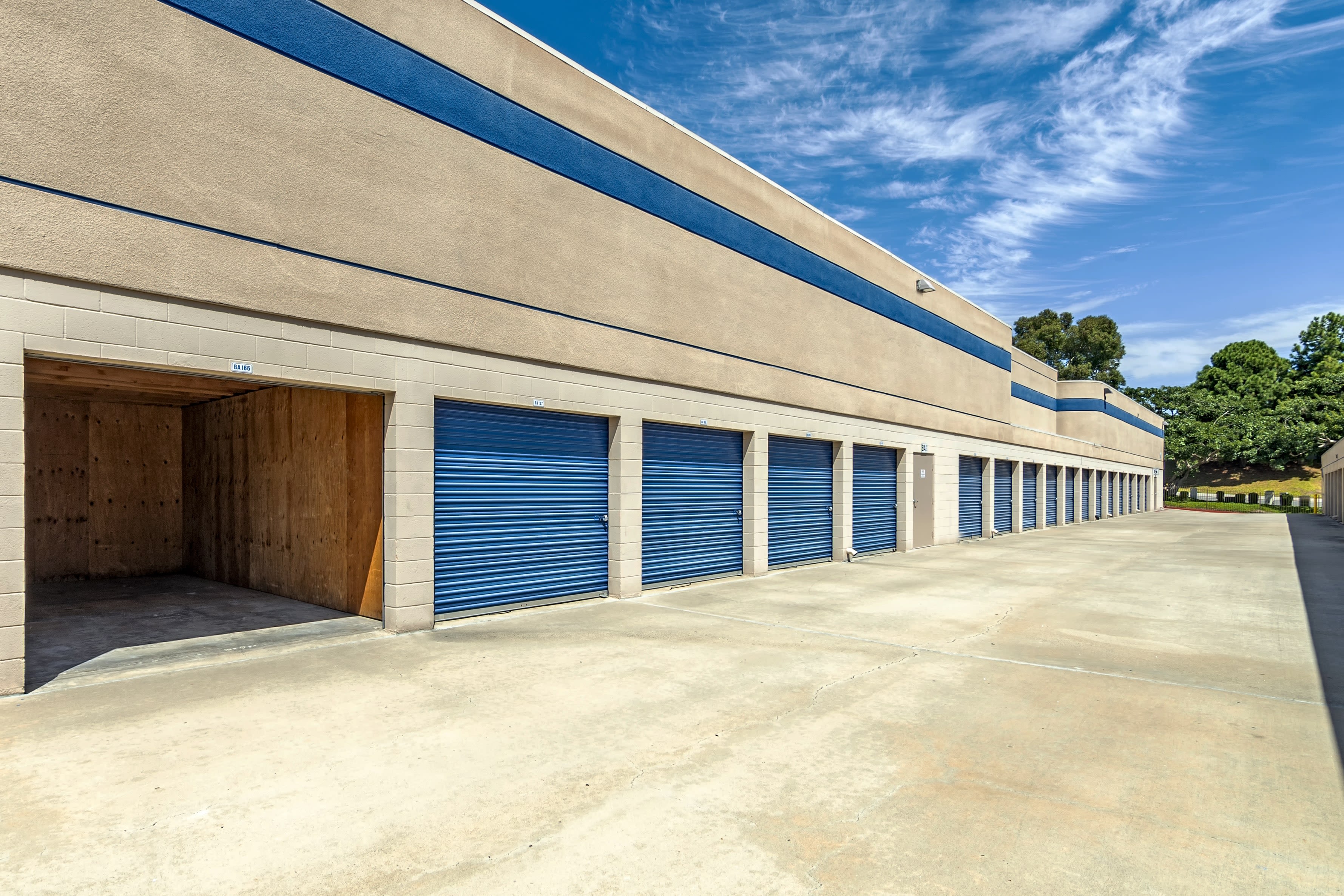 A row of outdoor storage units at Mira Mesa Self Storage in San Diego, CA