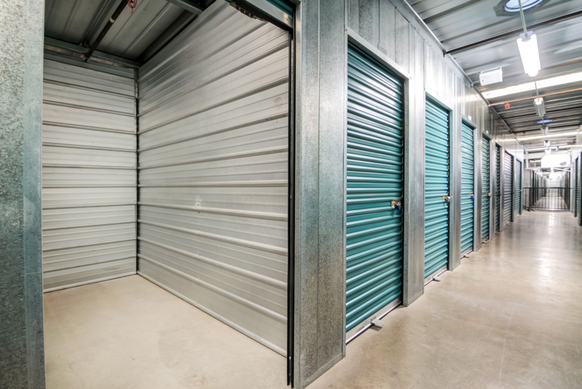 An open storage unit inside Olivenhain Self Storage in Encinitas, CA