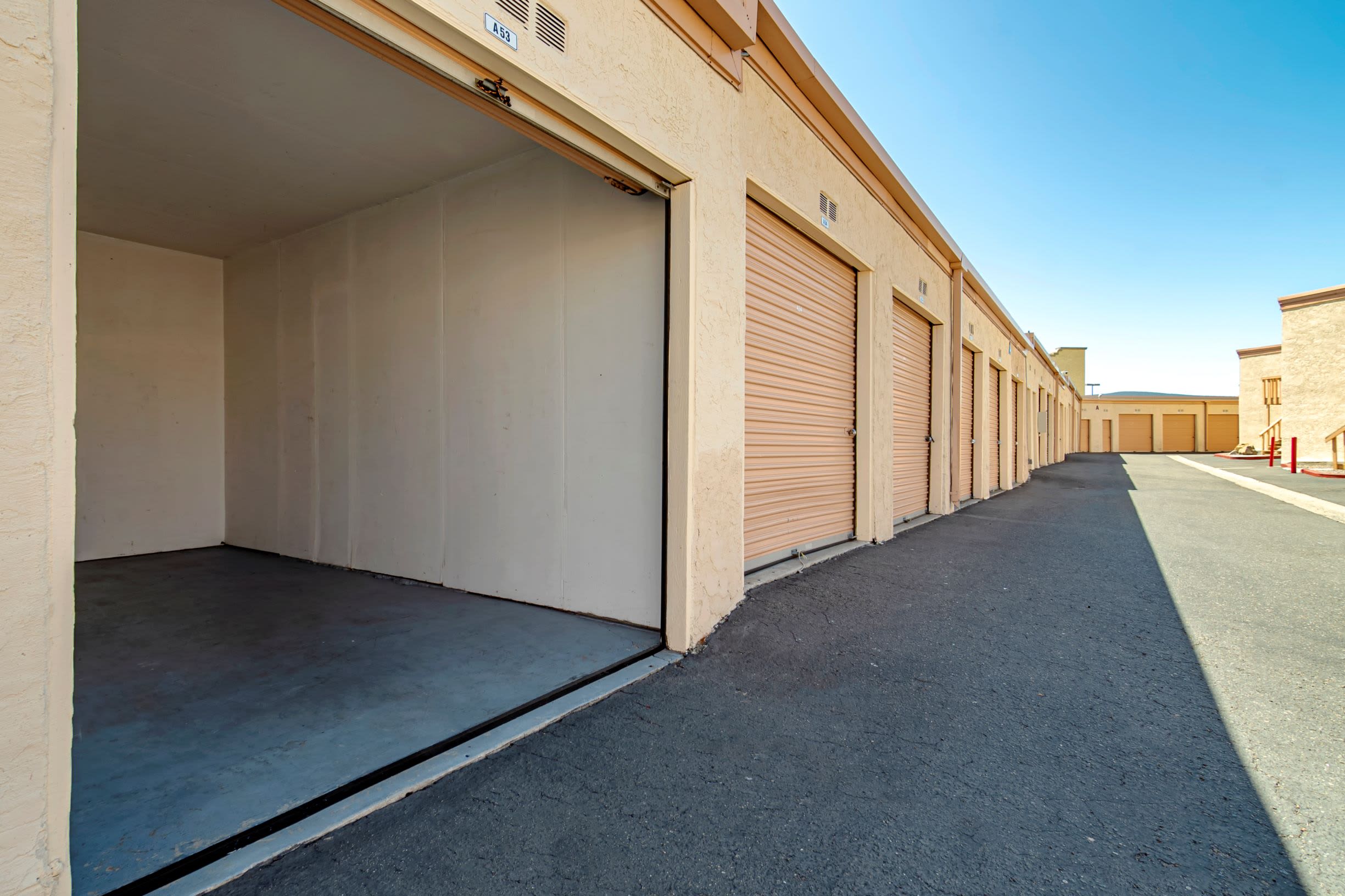 A row of storage units outside at San Marcos Mini Storage in San Marcos, CA