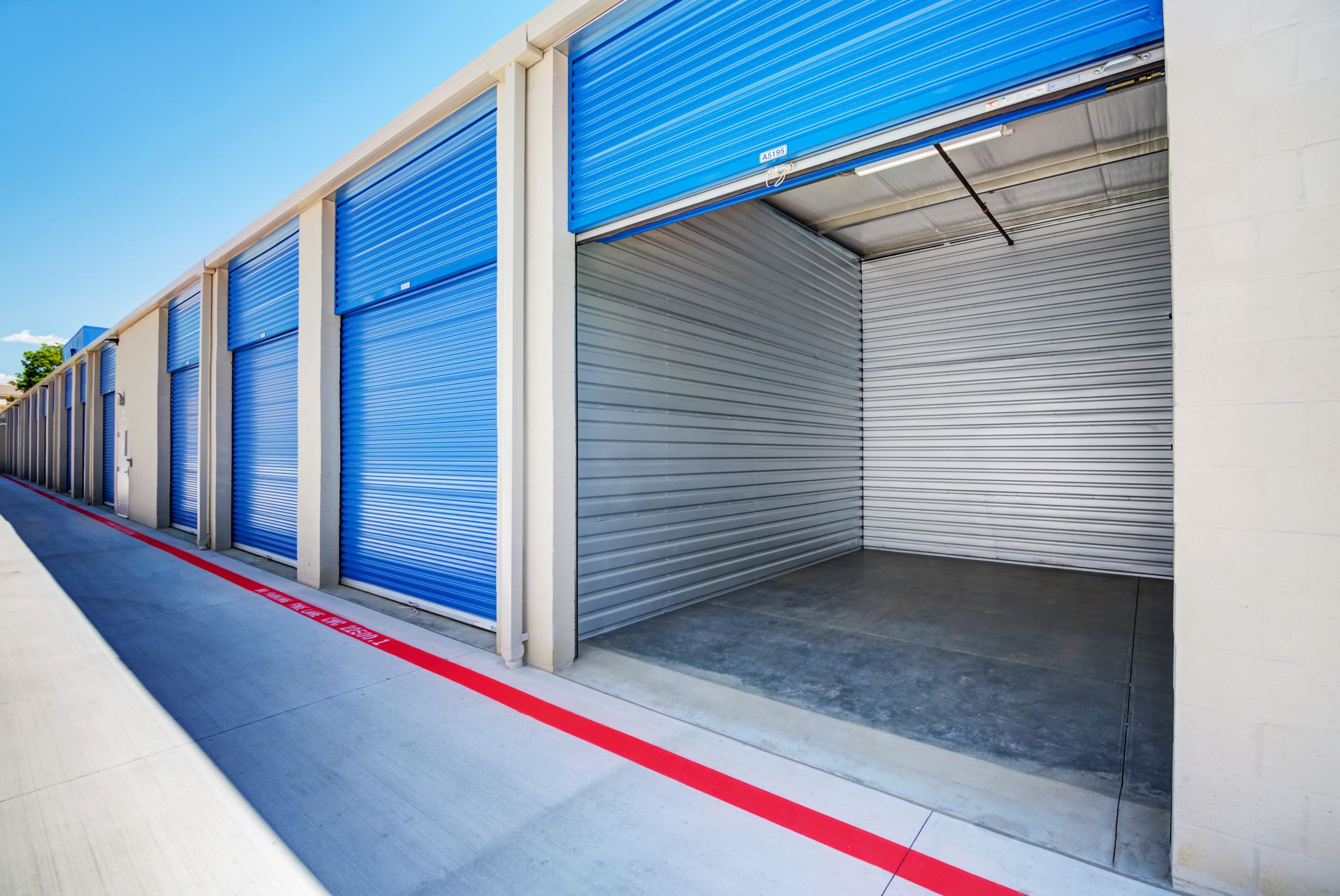 A half-open storage unit at Silverhawk Self Storage in Murrieta, CA