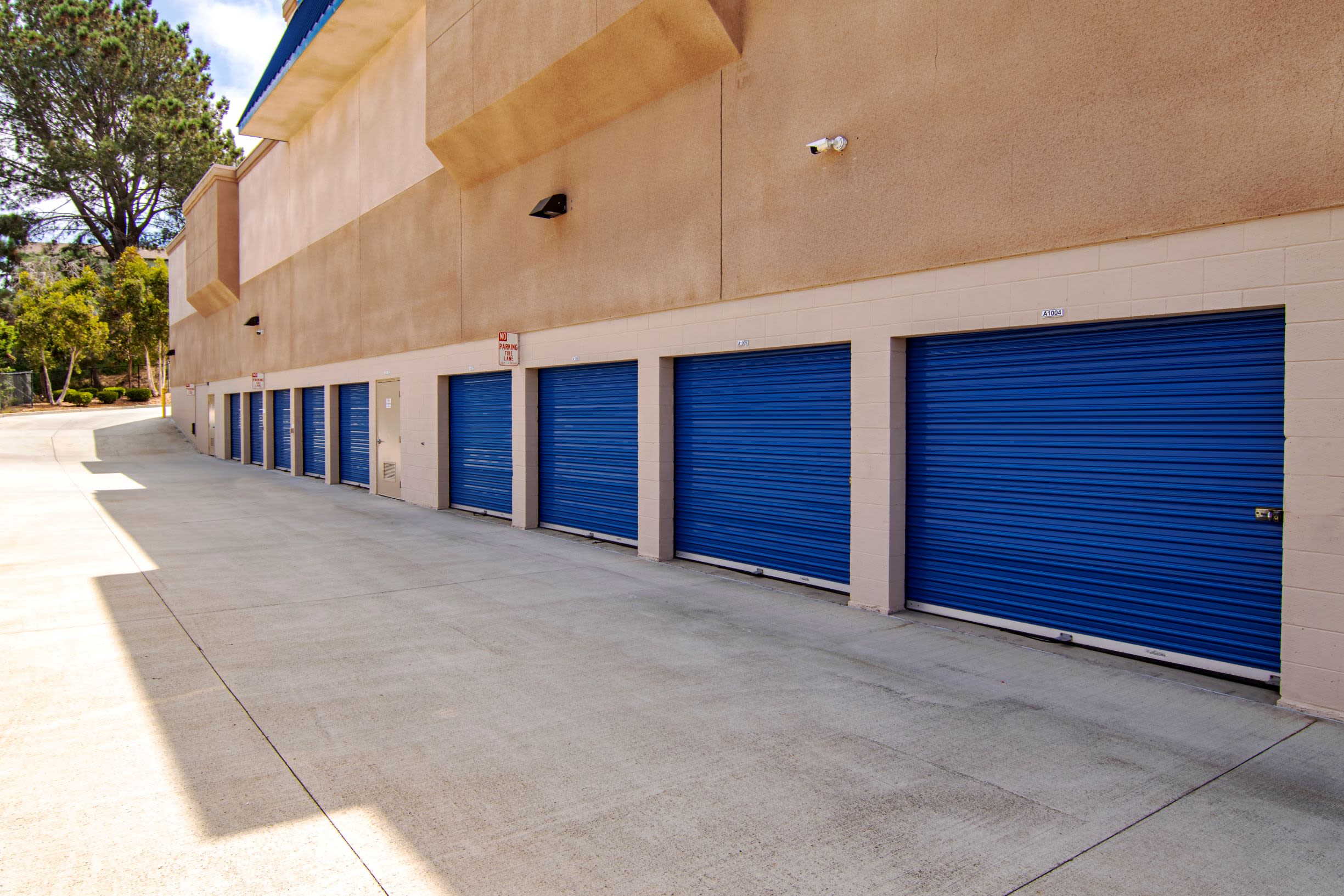 A row of outdoor storage units at Smart Self Storage of Solana Beach in Solana Beach, CA