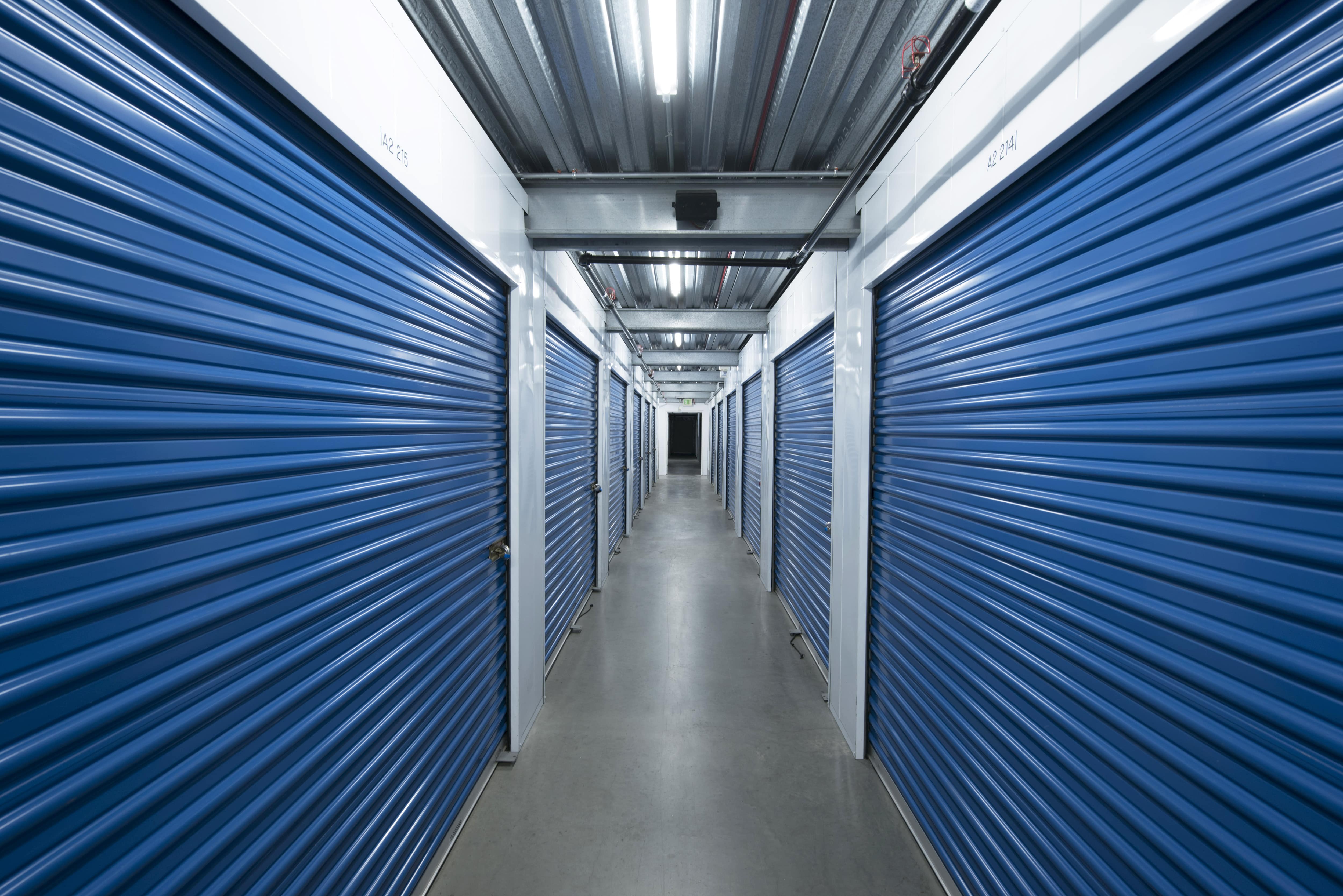 A hallway full of storage units at National/54 Self Storage in National City, CA