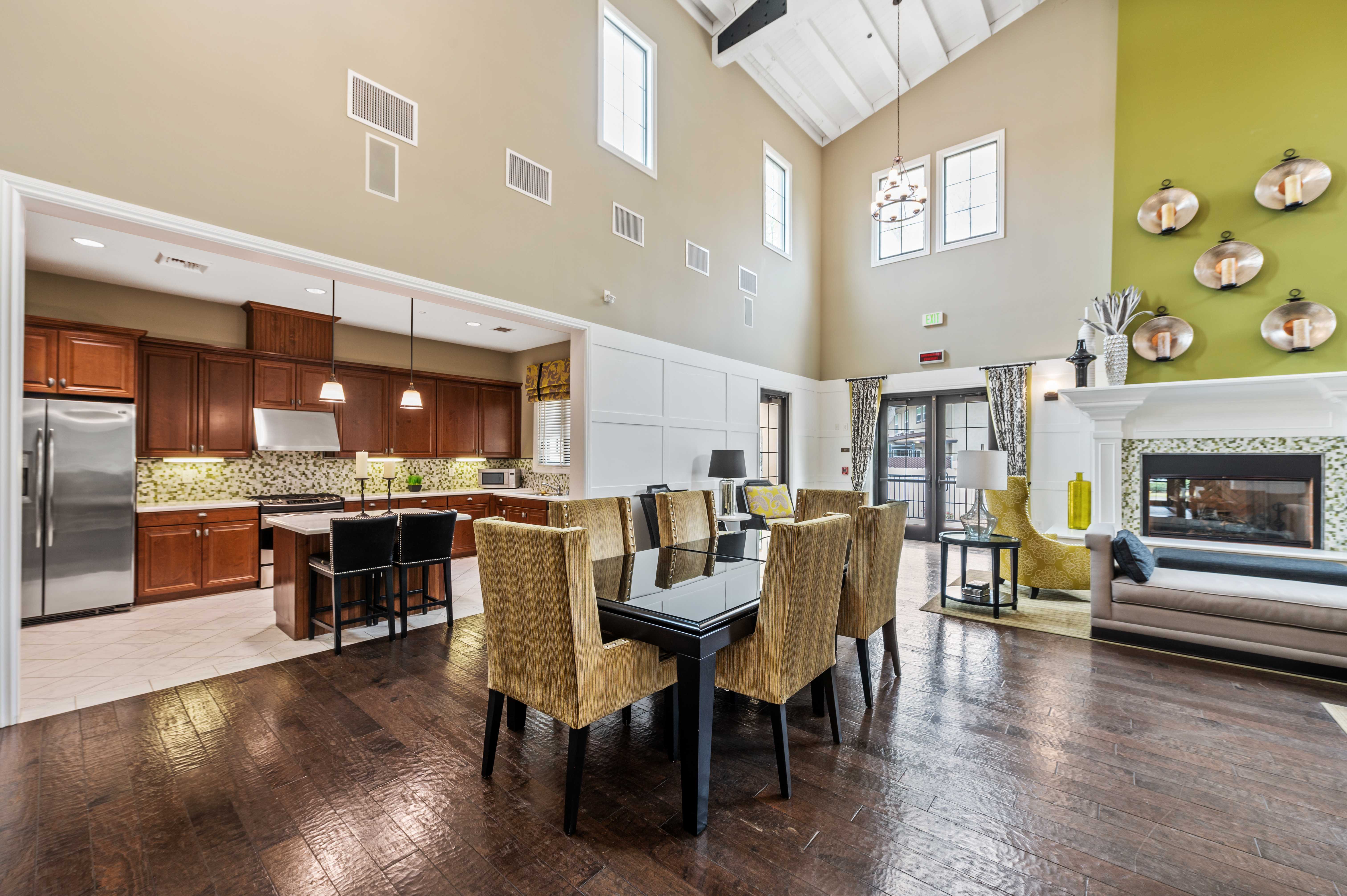 Community clubhouse with full kitchen, fire place, and seating at Coral Sea Cove in Port Hueneme, California