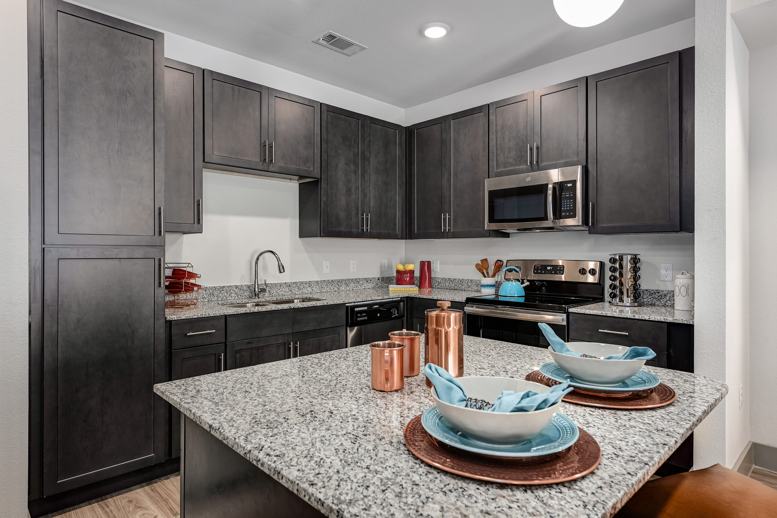 model kitchen with chef's island at Rocket Pointe in Durango, Colorado