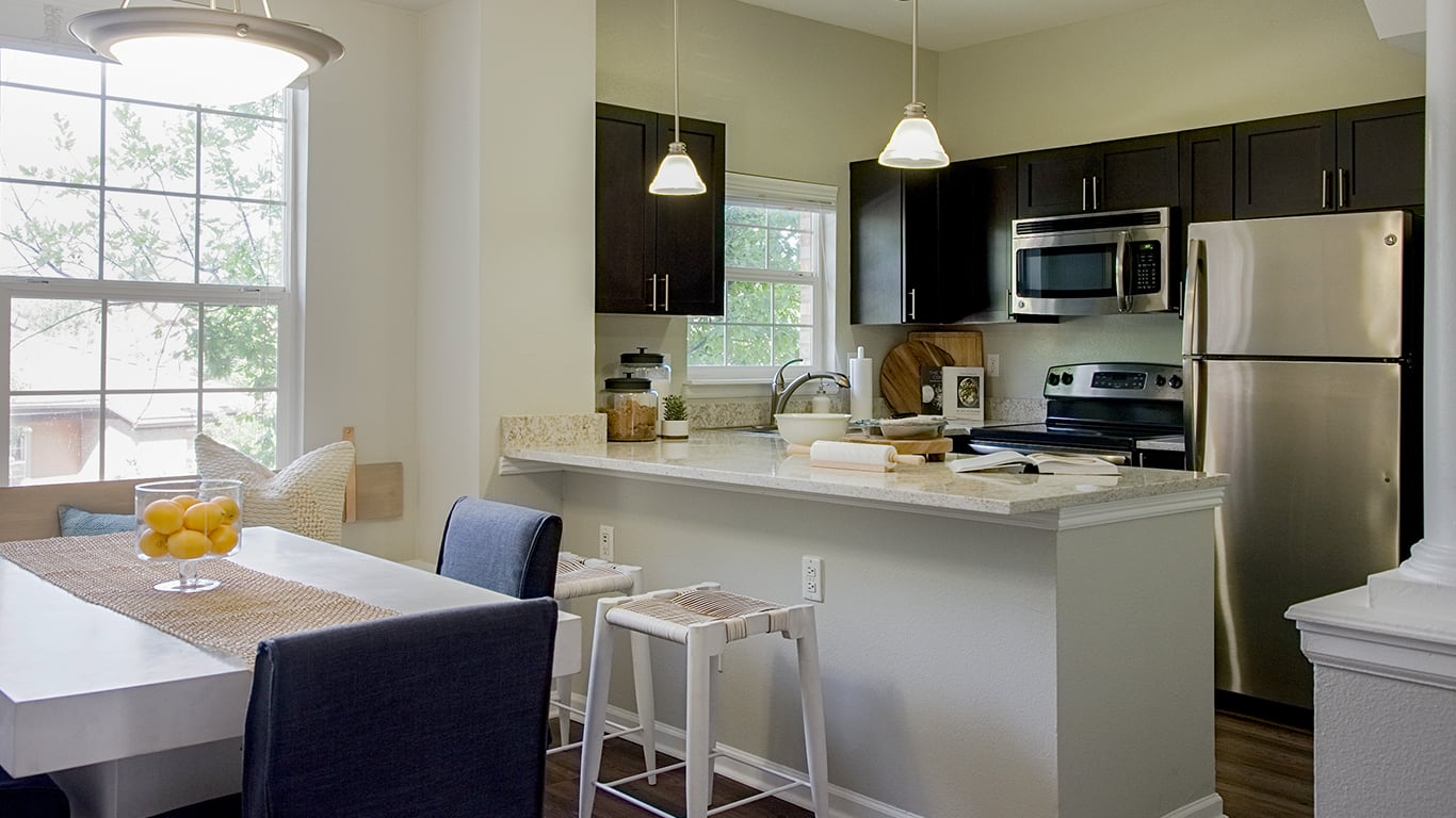 Apartment kitchen at Isabella Apartment Homes in Greenwood Village, Colorado