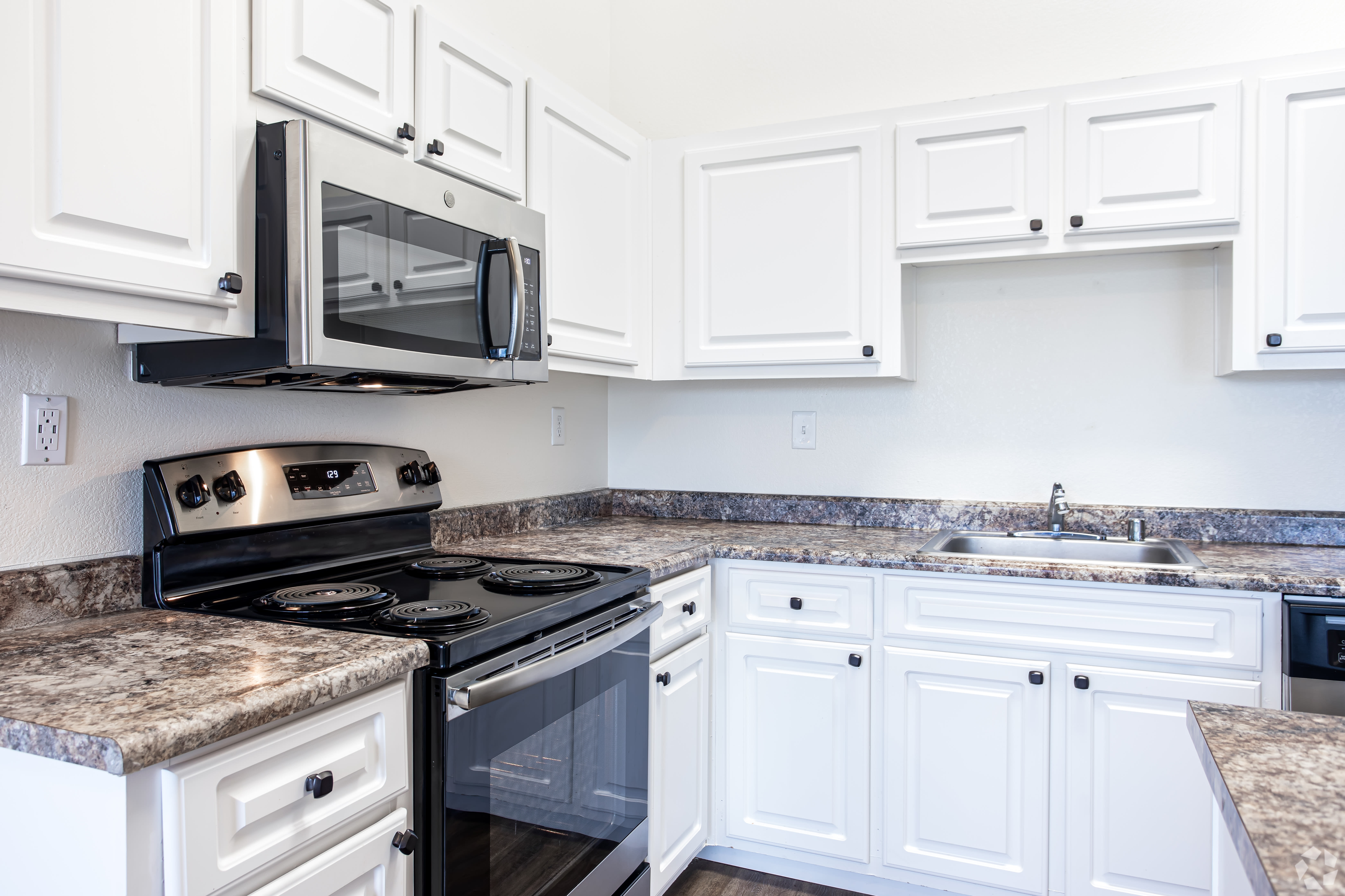 Beautiful, gourmet kitchen in a model home at Quail Hill Apartment Homes in Castro Valley, California