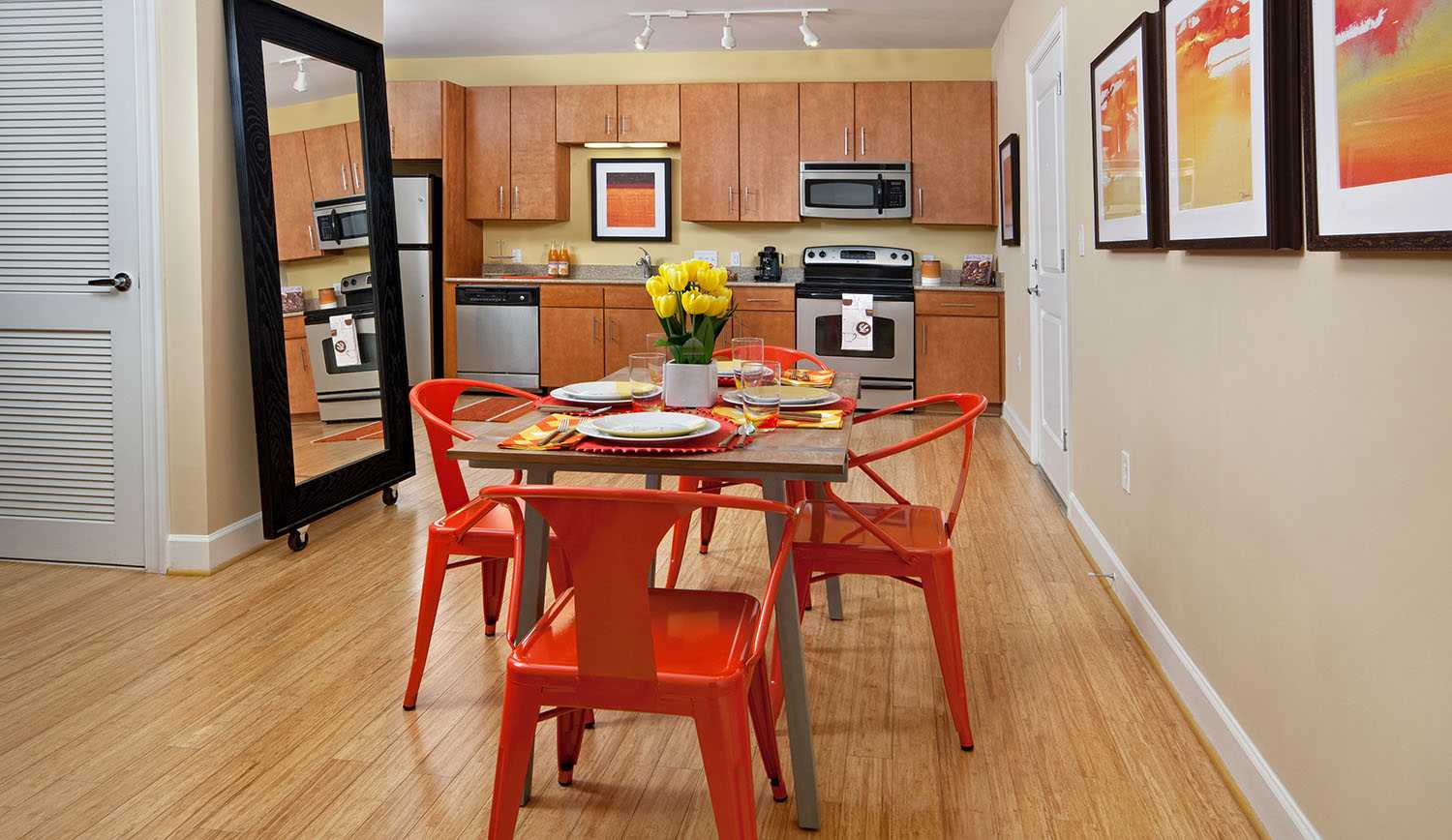 Open concept dining room and kitchen in a model apartment home at Cielo in Charlotte, North Carolina
