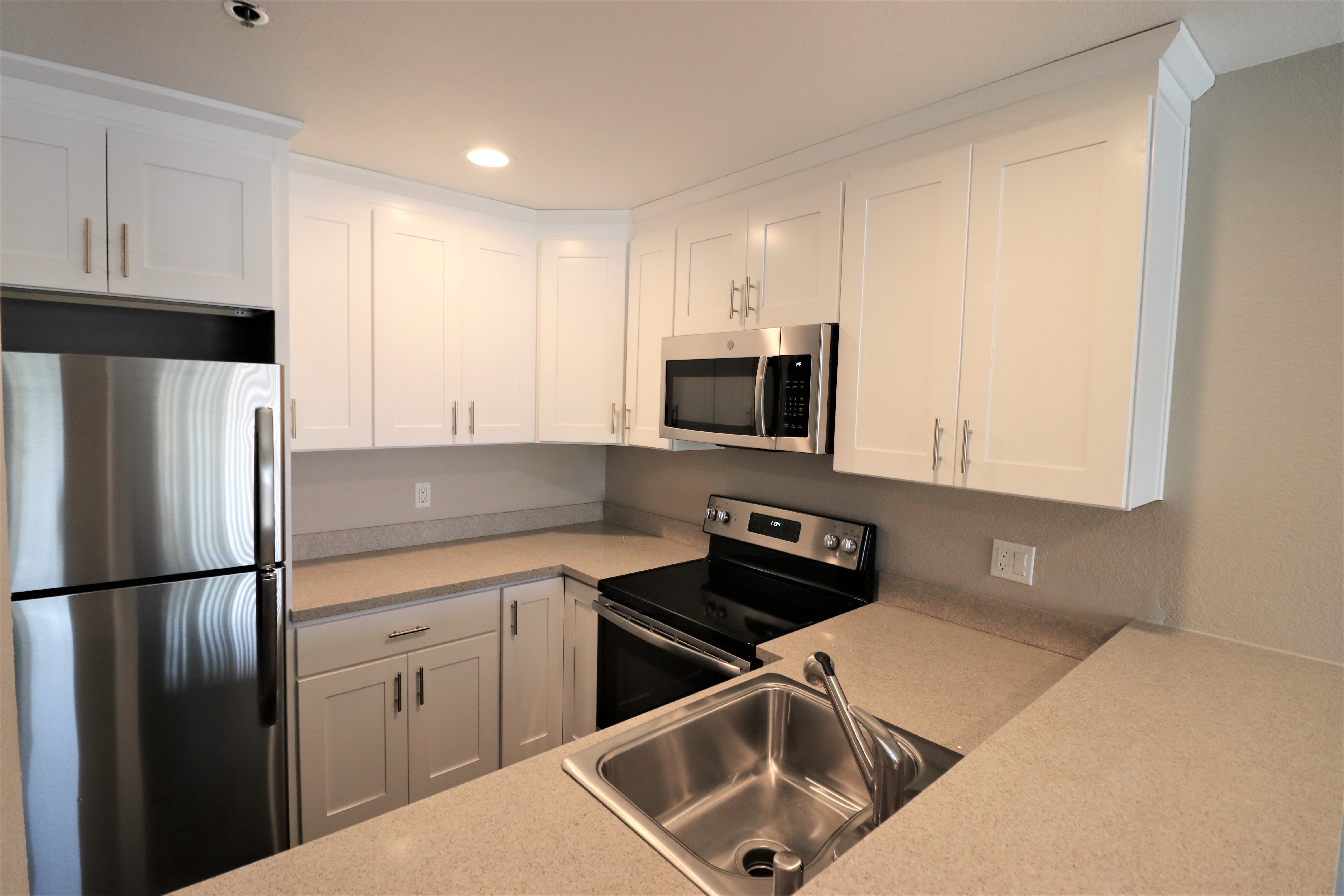 Model kitchen with updated appliances at Summerhill Terrace Apartment Homes in San Leandro, California