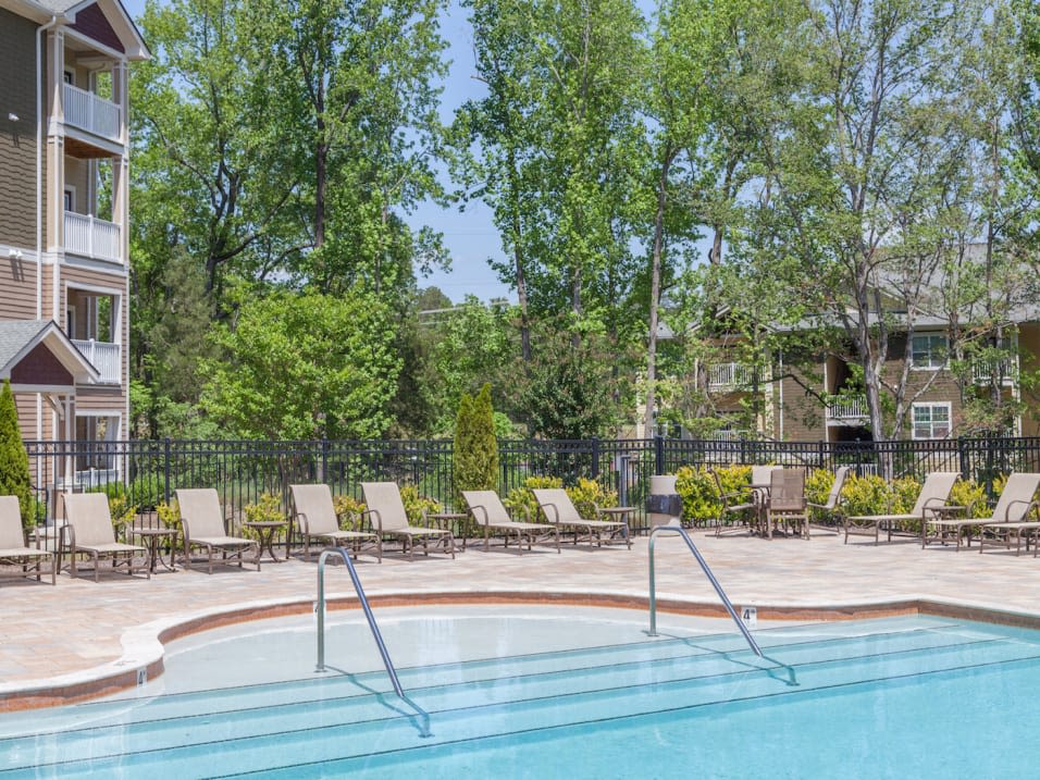 Pool and lounge chairs at Latitude at Mallard Creek in Charlotte, North Carolina