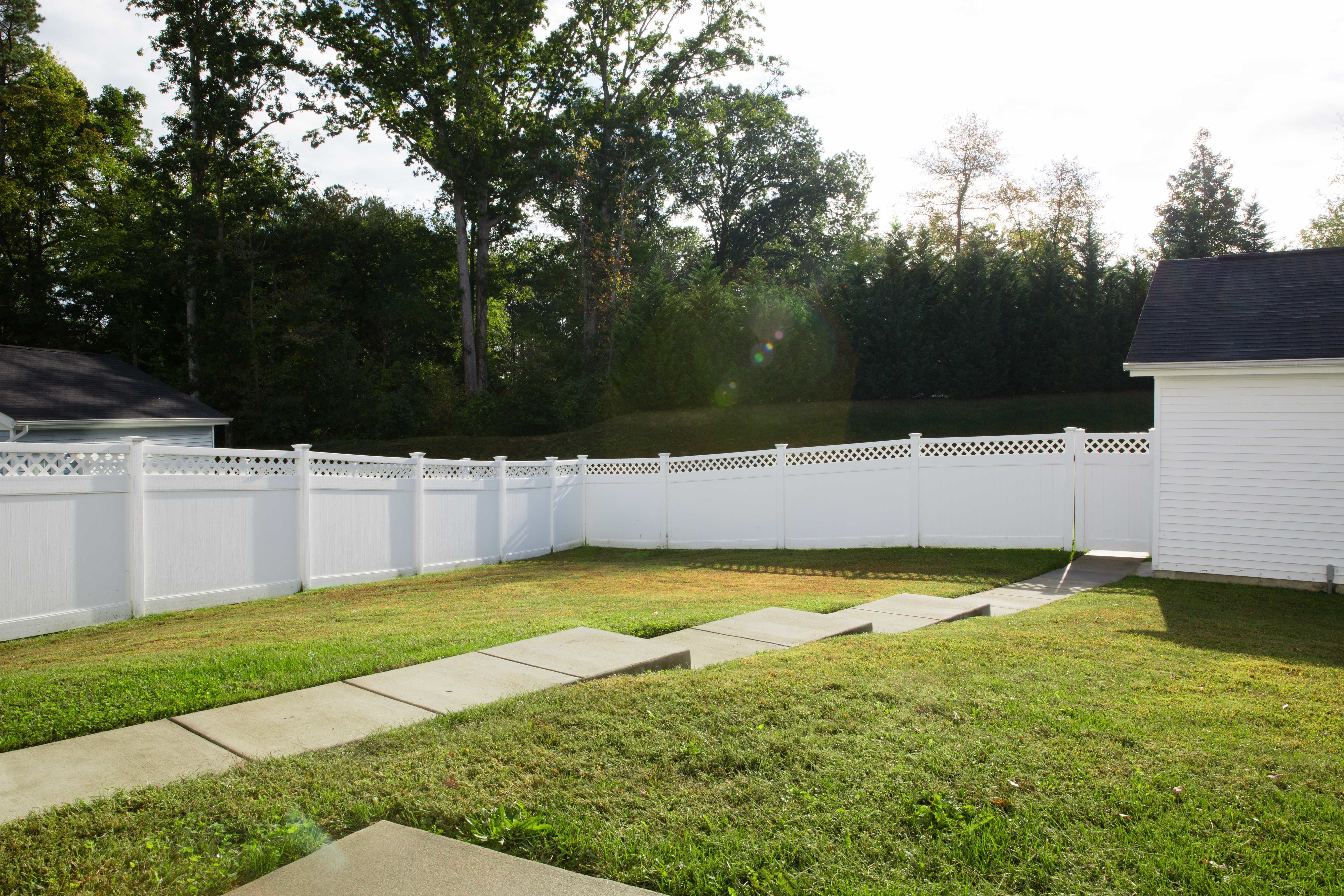 A fenced backyard at Columbia Colony in Patuxent River, Maryland