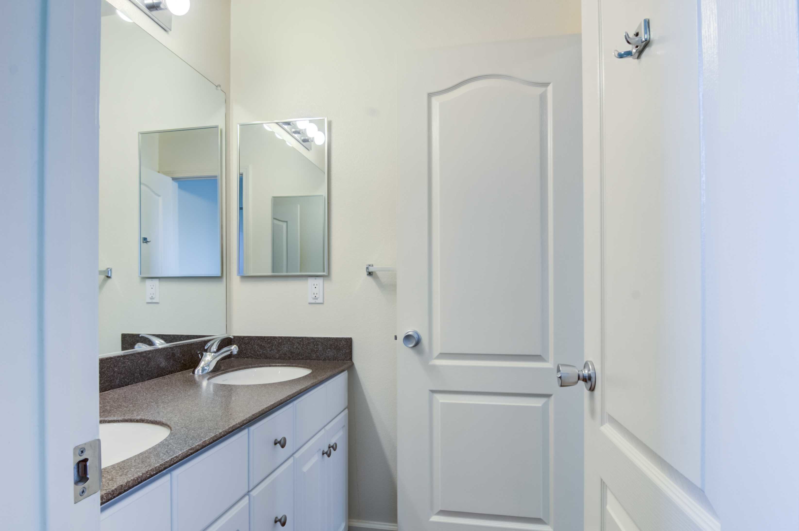 The bathroom in the main bedroom of a home at San Luis Rey in Oceanside, California