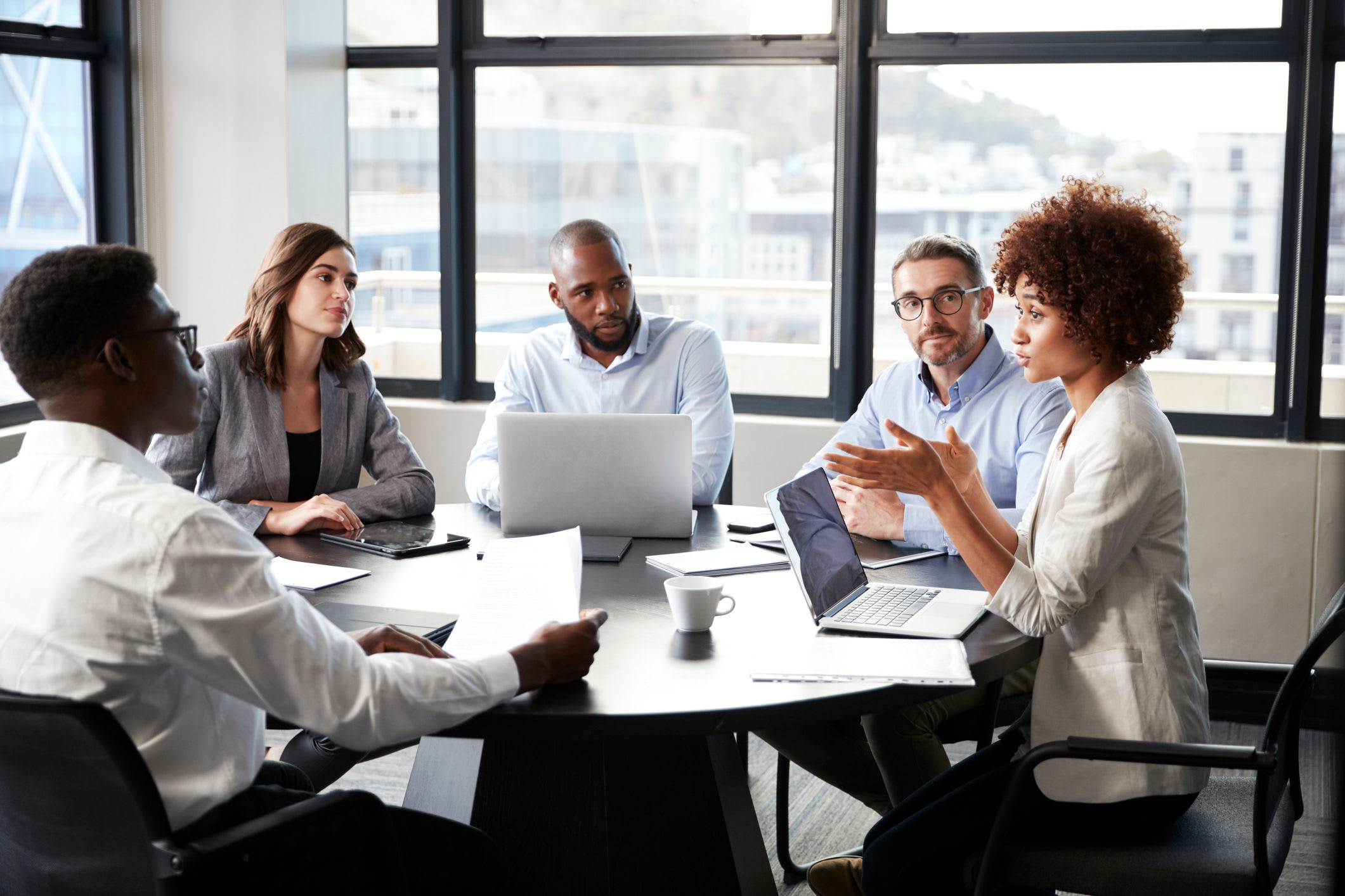 Employees in an office meeting at Advantage Self Storage in Louisville, Colorado