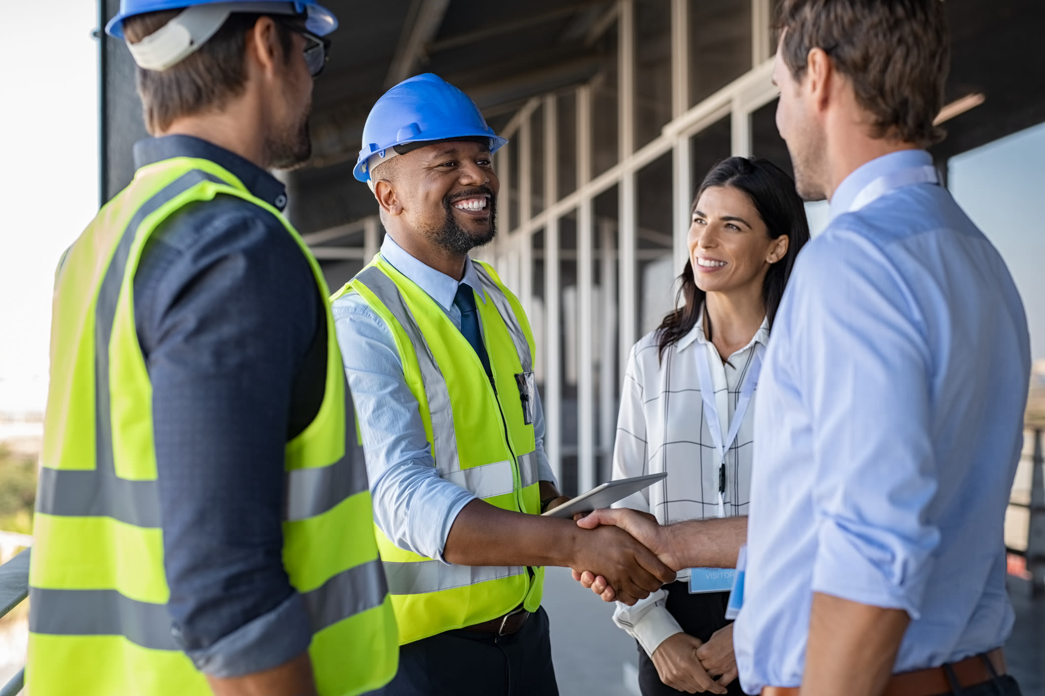 Construction workers having a conversation near Advantage Self Storage in Louisville, Colorado