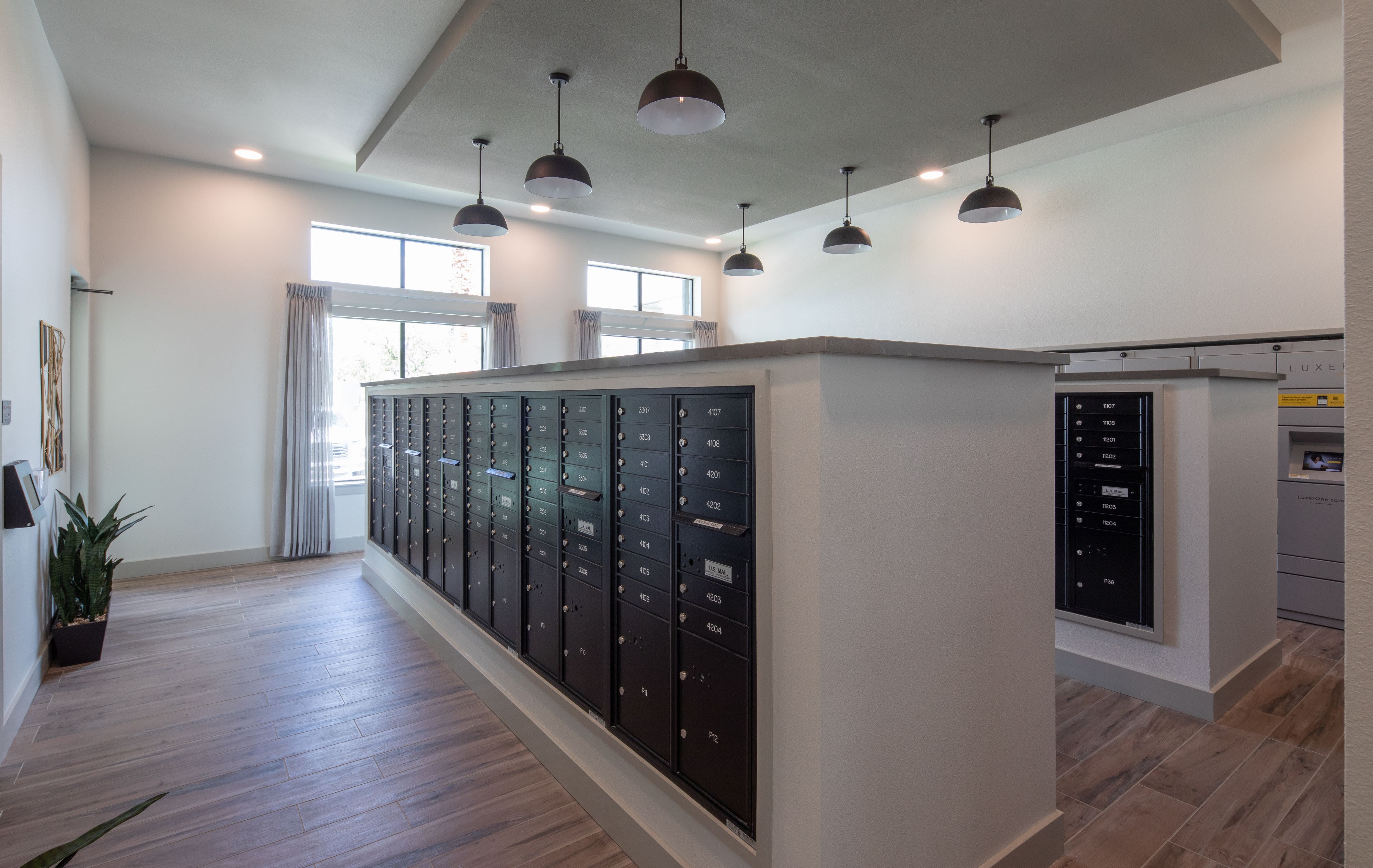 Mailboxes and Luxer package lockers at Linden at The Rim in San Antonio, Texas