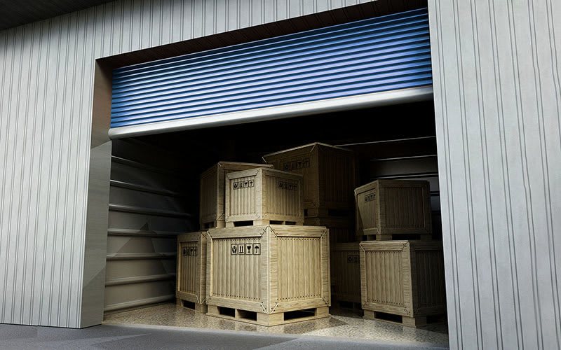 An open storage unit full of crates at GoodFriend Self Storage Bedford Hills in Bedford Hills, New York