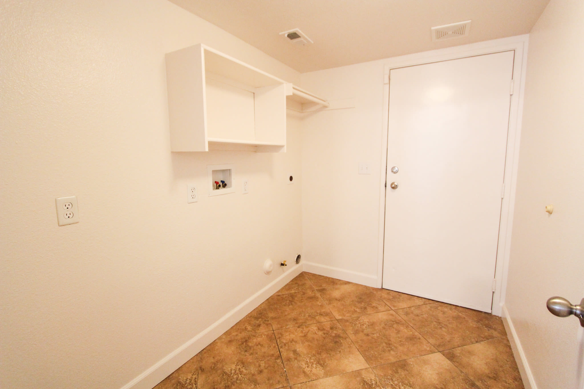The laundry room in a home at Chollas Heights in San Diego, California
