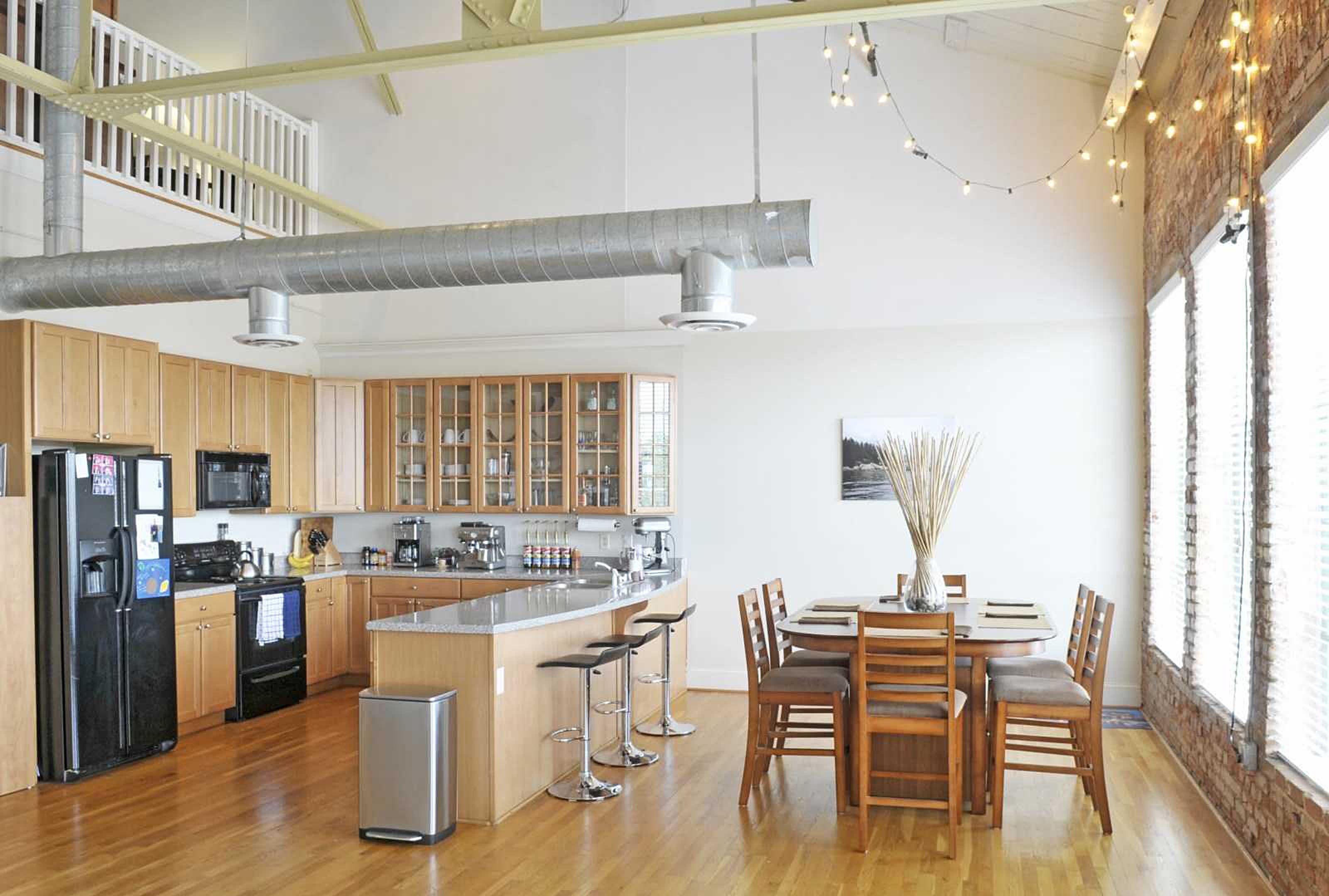 Kitchen with industrial style design at Broadway Lofts in Macon, Georgia