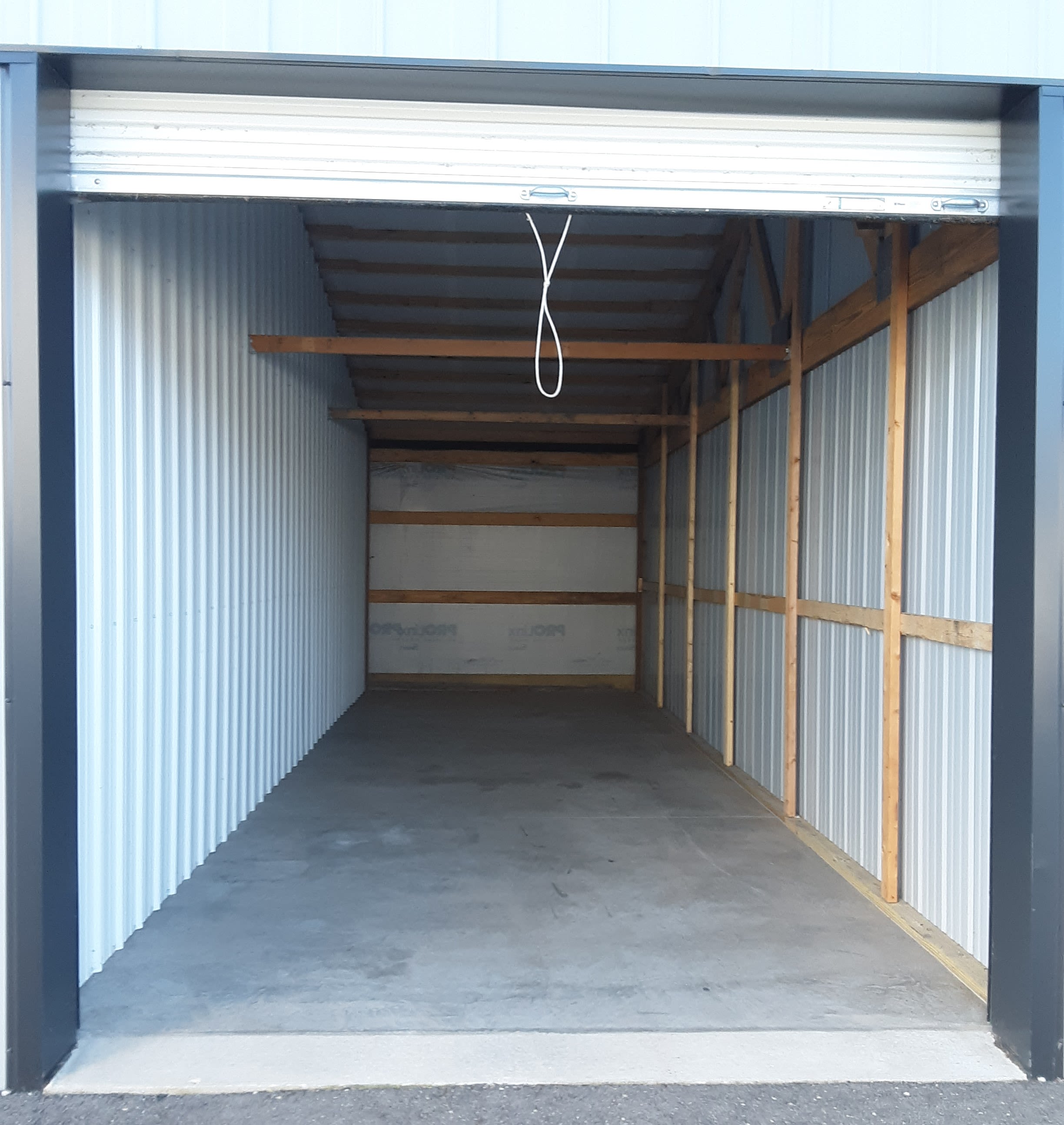 A storage unit filled with boxes at KO Storage of Owatonna Drive Up in Owatonna, Minnesota