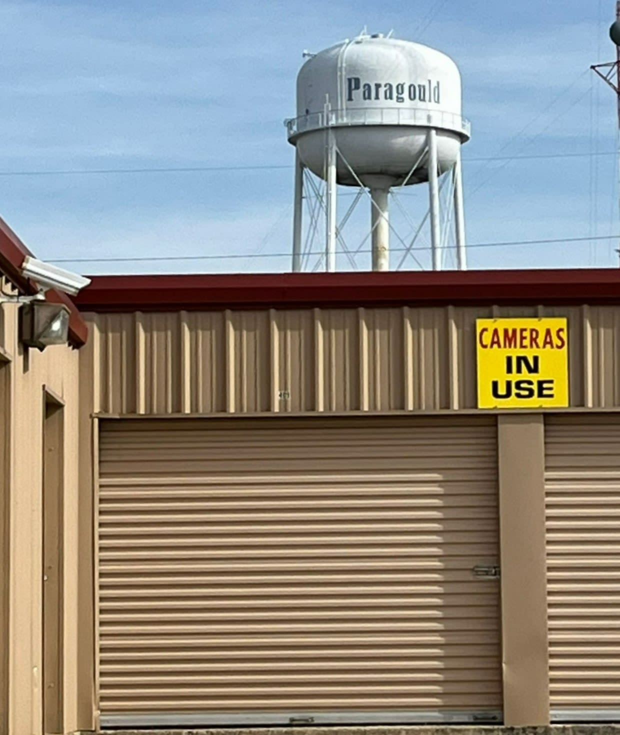 Storage units with blue doors and locks at KO Storage in Paragould, Arkansas
