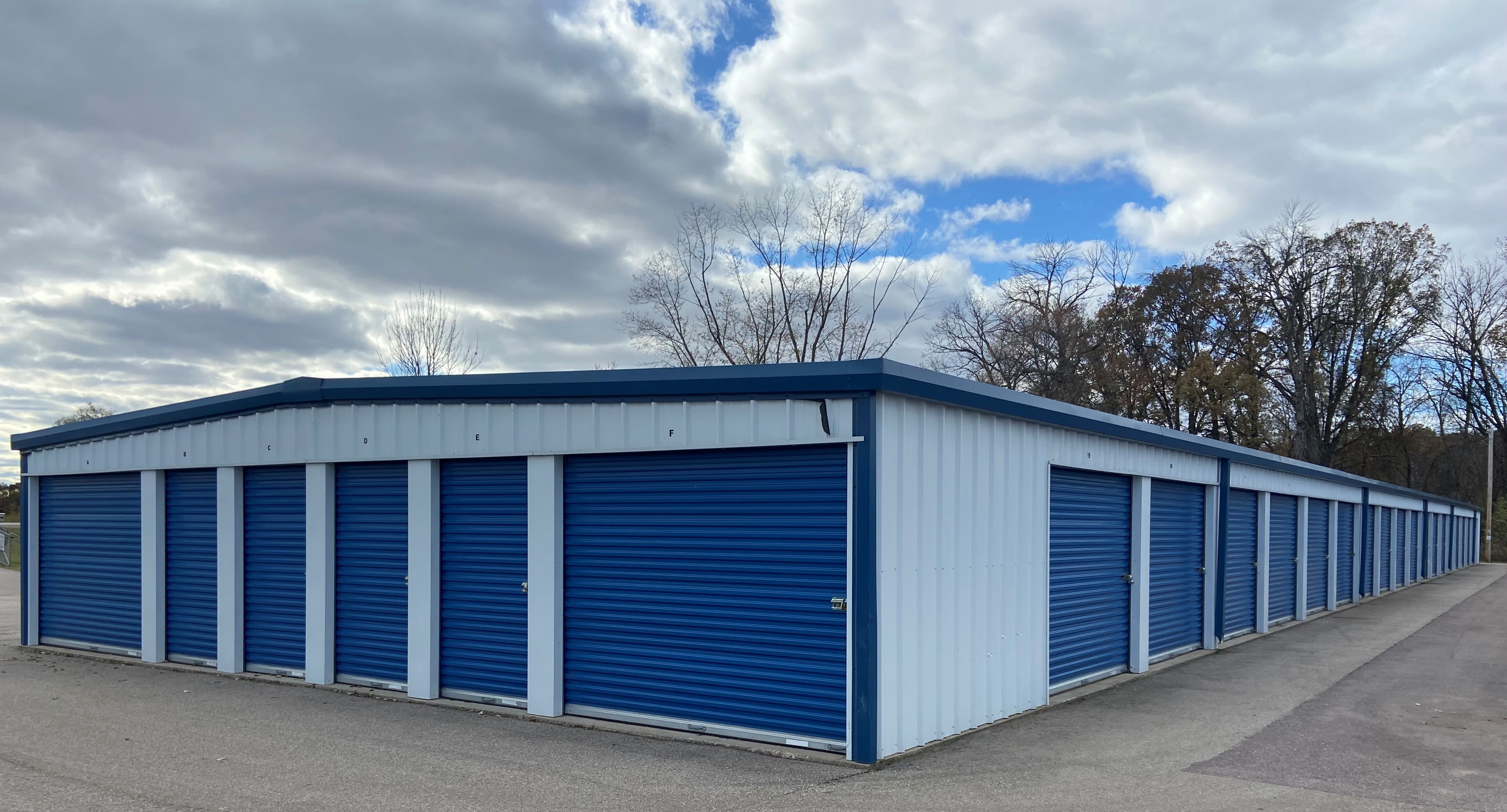 Storage units with blue doors at KO Storage in Wisconsin Dells, Wisconsin