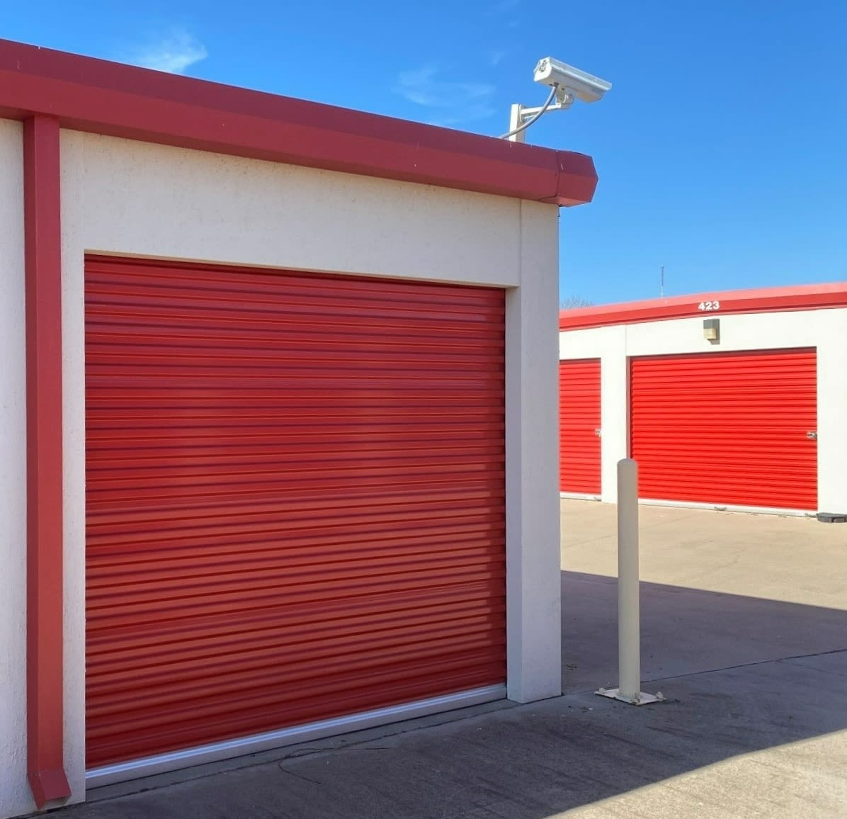 Red and orange storage units at KO Storage in Wichita Falls, Texas