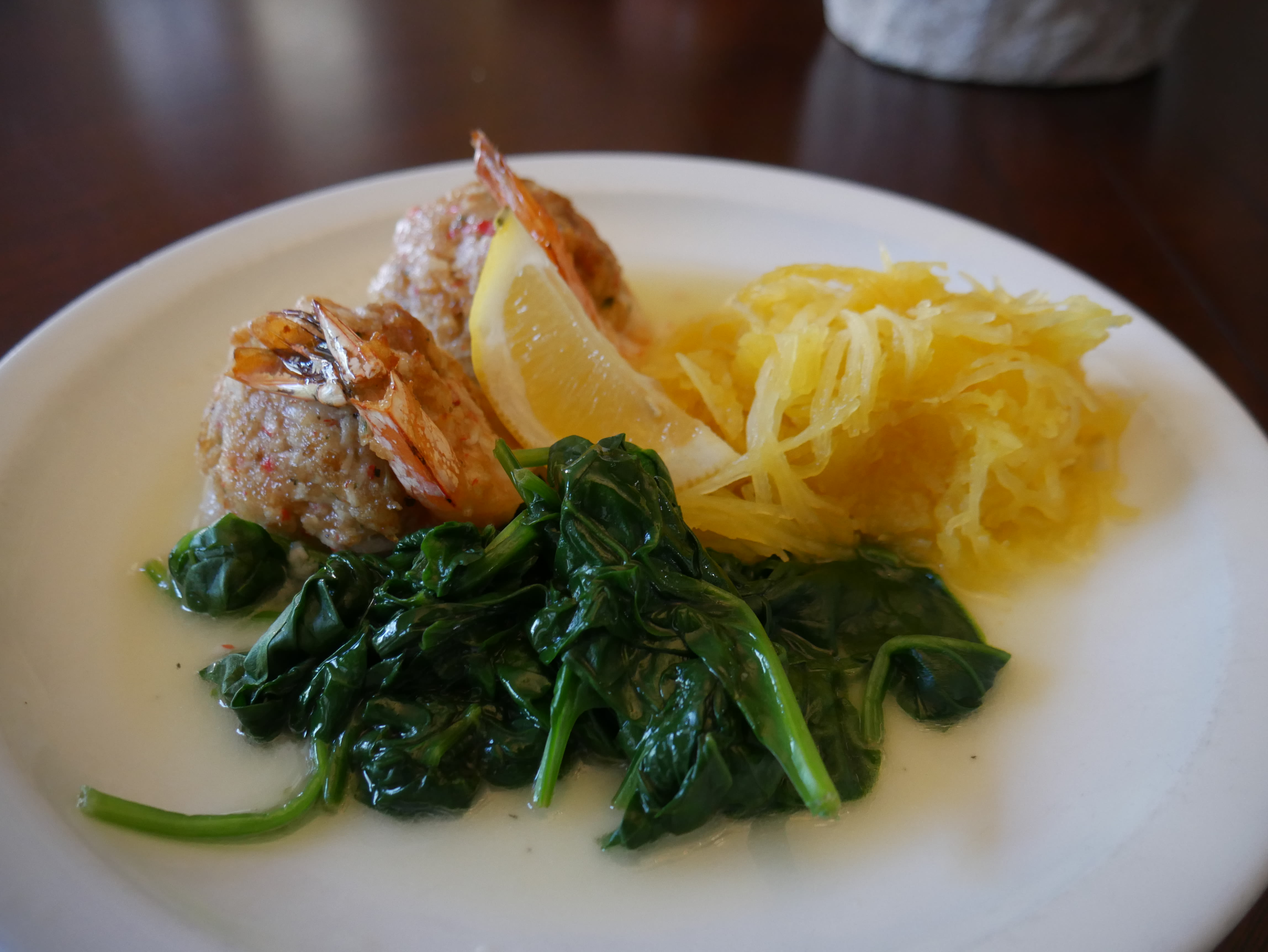 Stuffed shrimp with lemon-roasted spaghetti squash and spinach