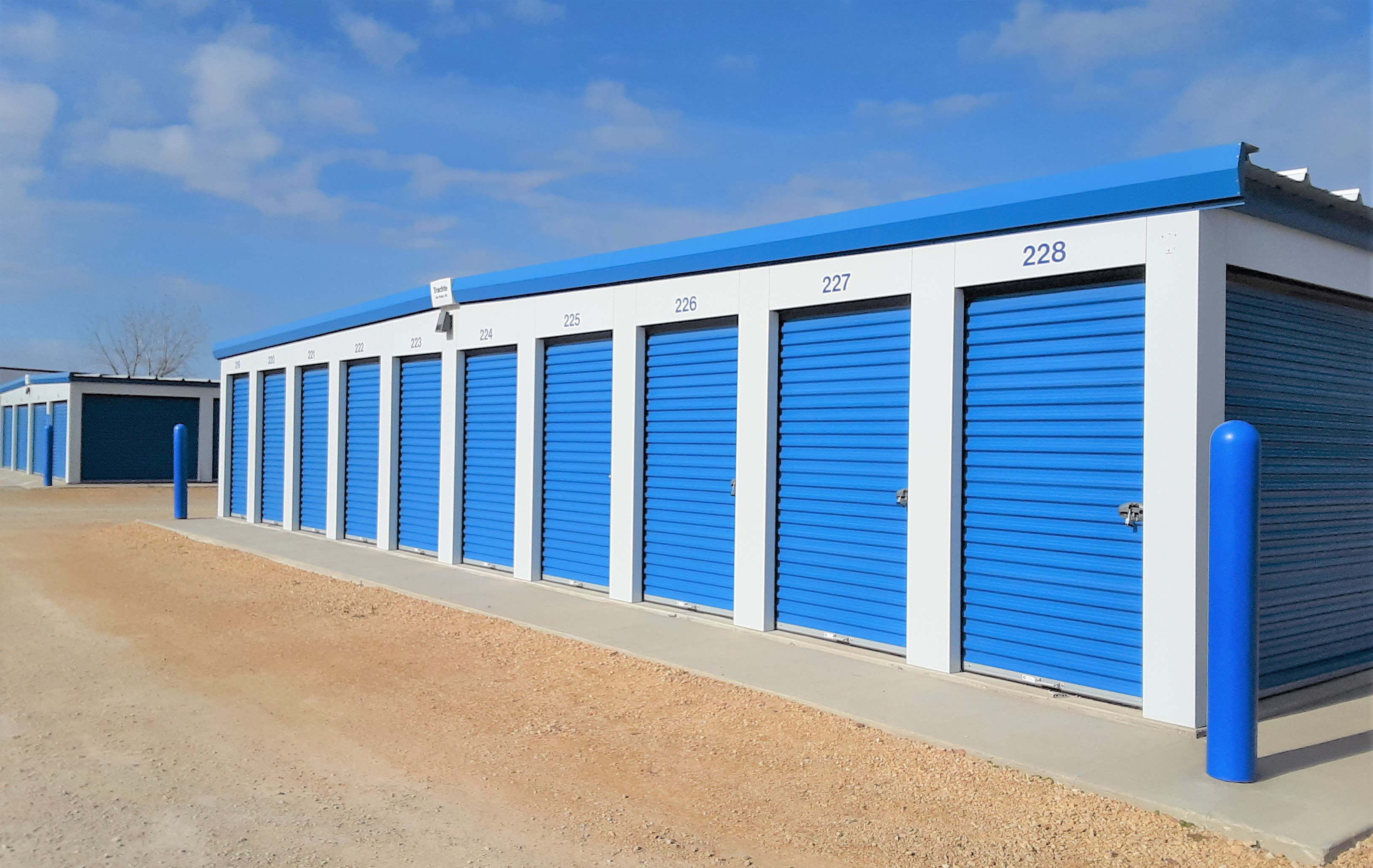Storage units with blue doors at KO Storage of Waseca 15th Ave in Waseca, Minnesota