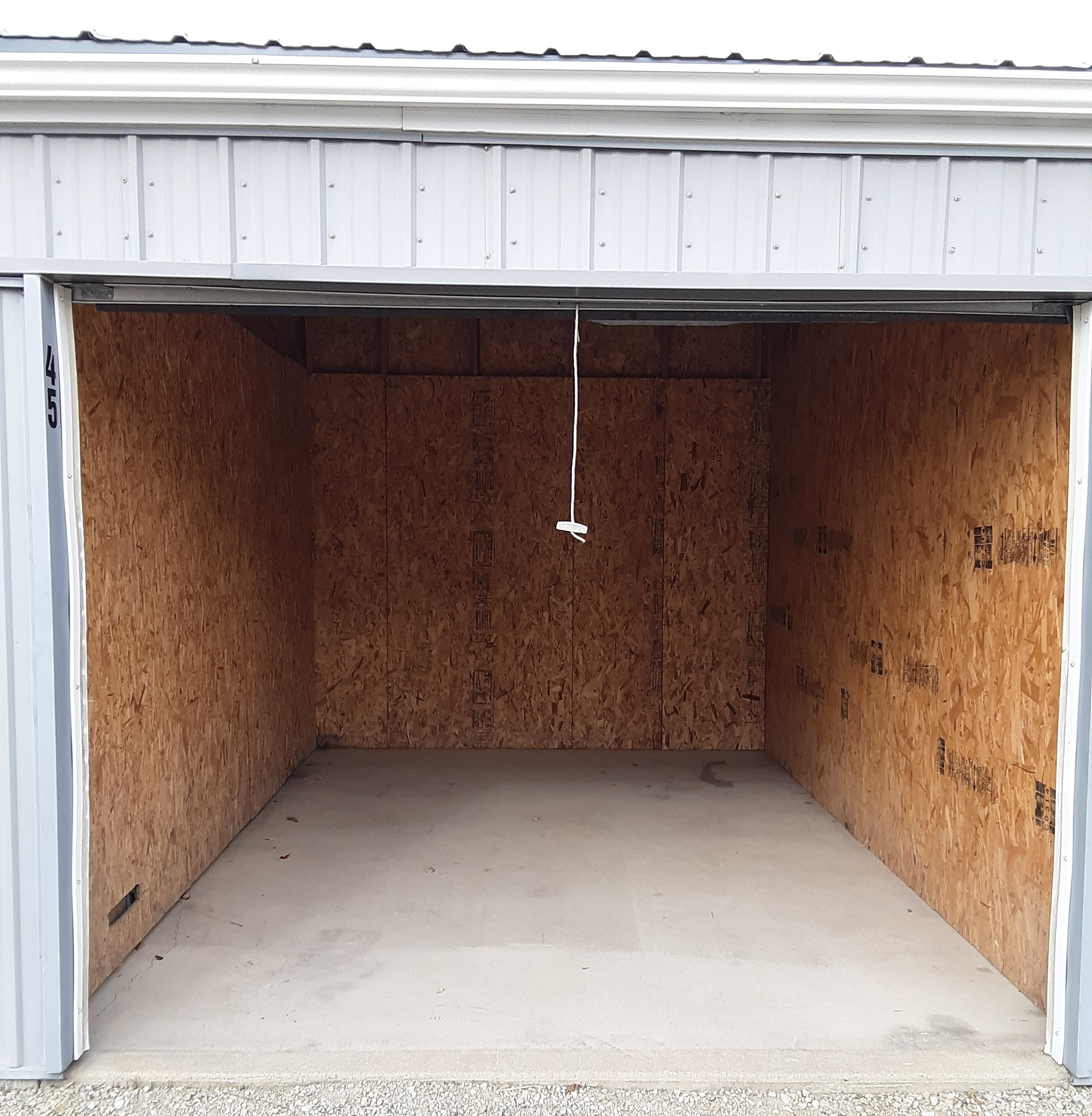 Outdoor storage units with white doors at KO Storage in Waseca, Minnesota